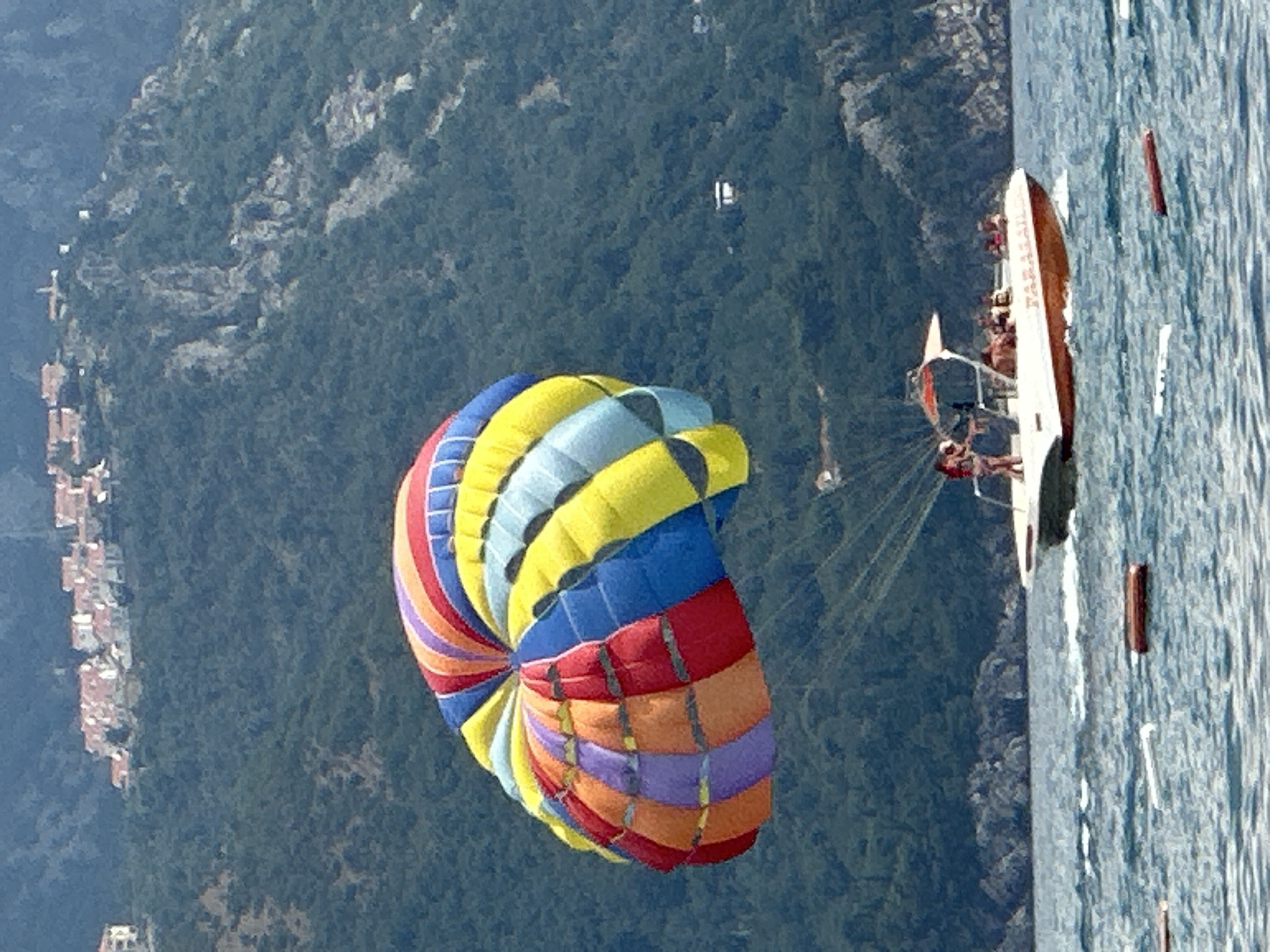 Parasailing and water sports fill a summer afternoon in Boreti