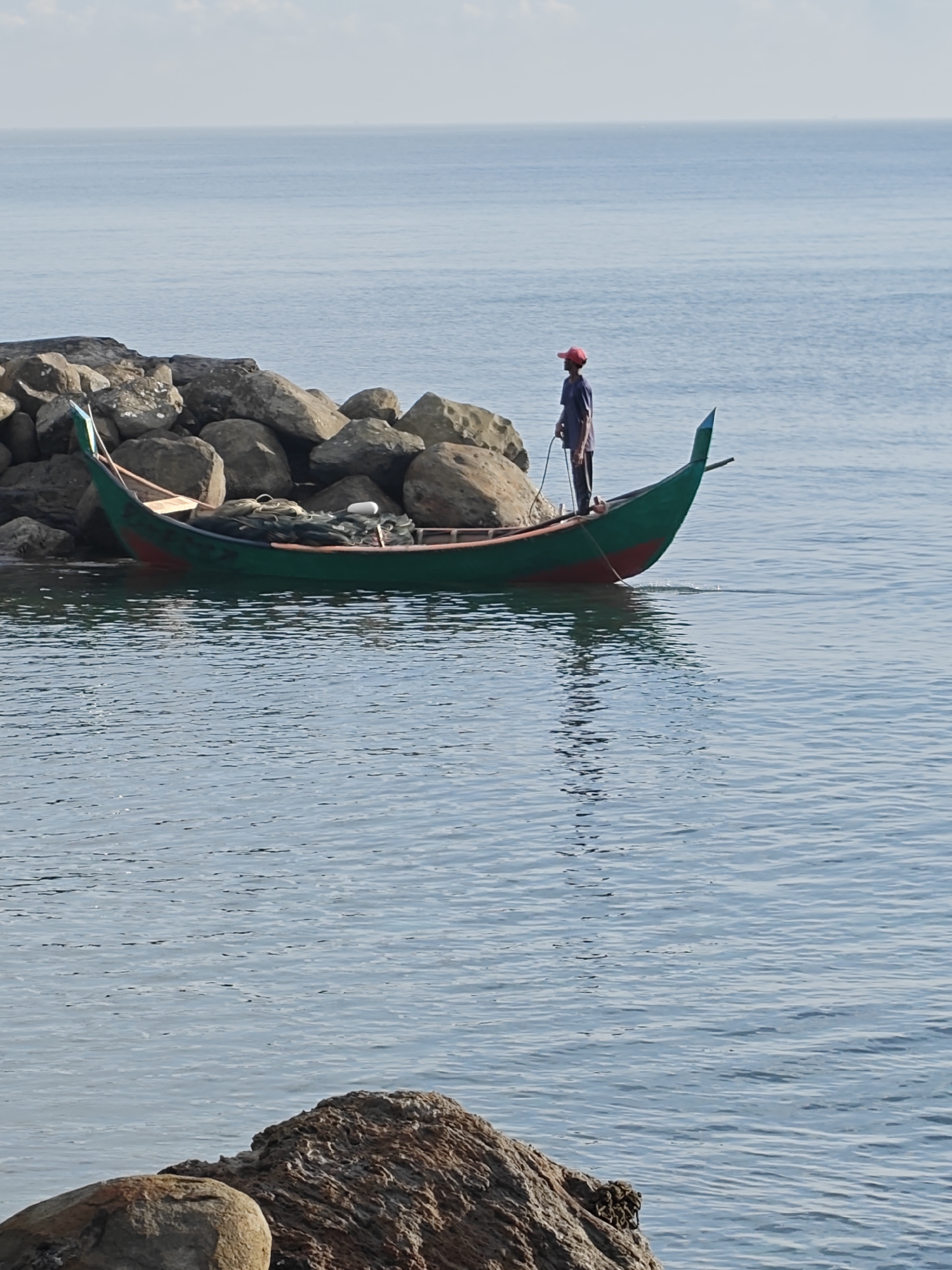 Morning fishing and wildlife observed on Lhokseumawe coastline