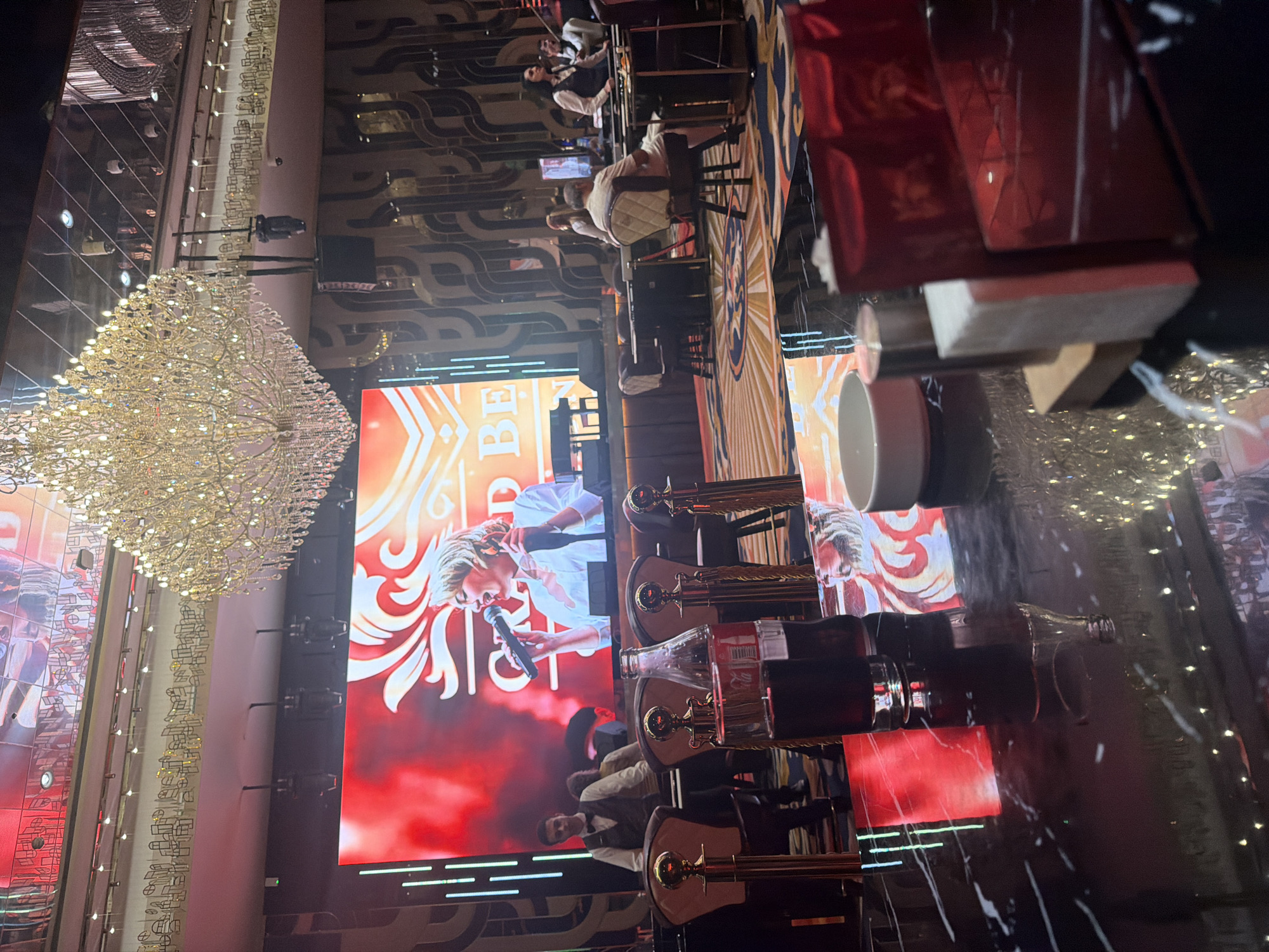 Witness captures upscale entertainment venue with crystal chandelier