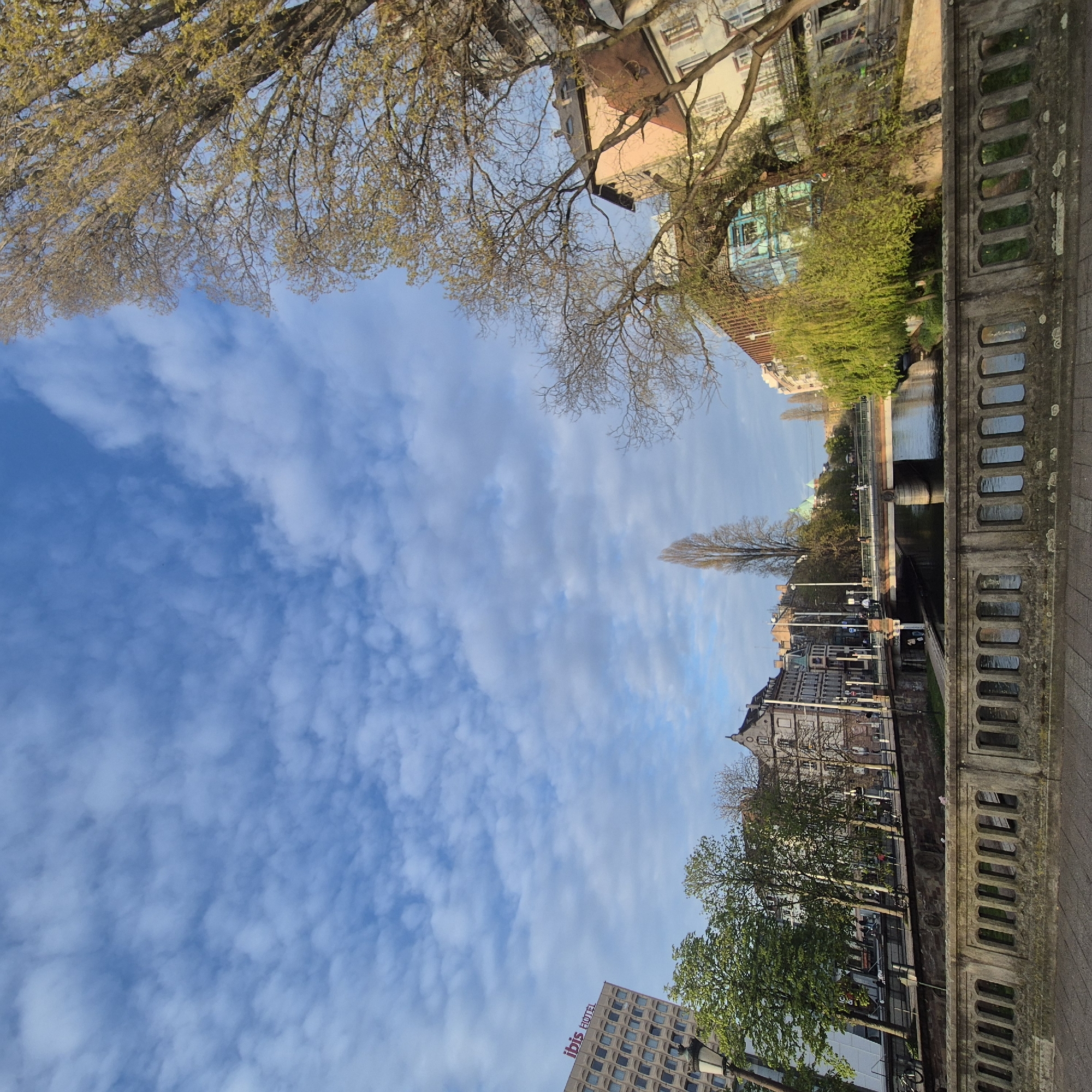Tourist captures Strasbourg canal and hotel district views