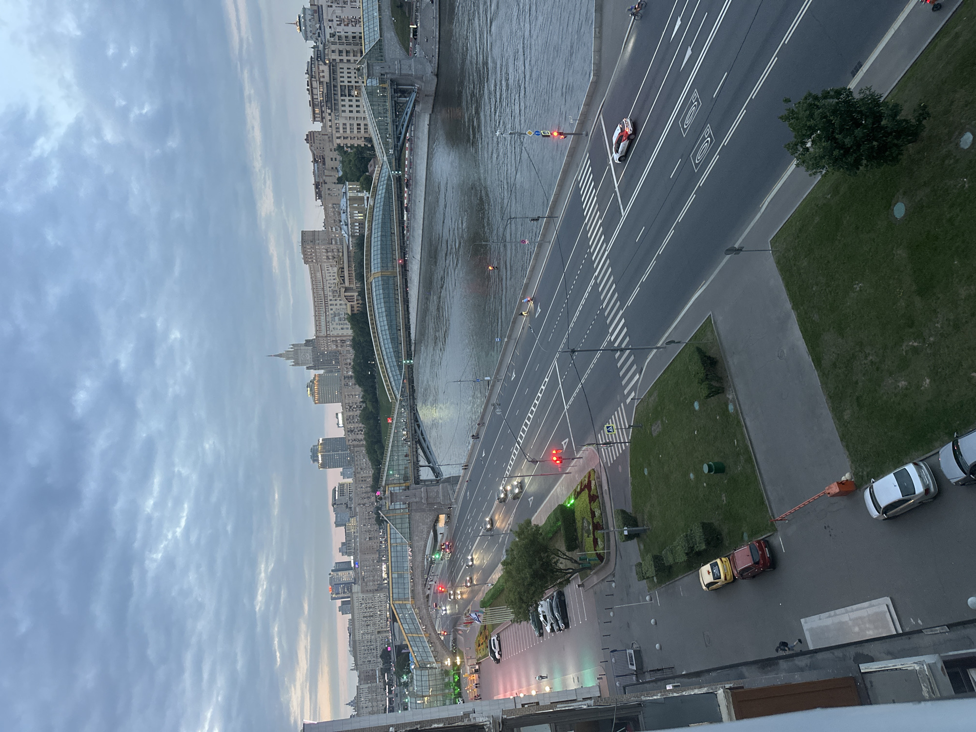 Moscow River at dusk, boats moving through the city