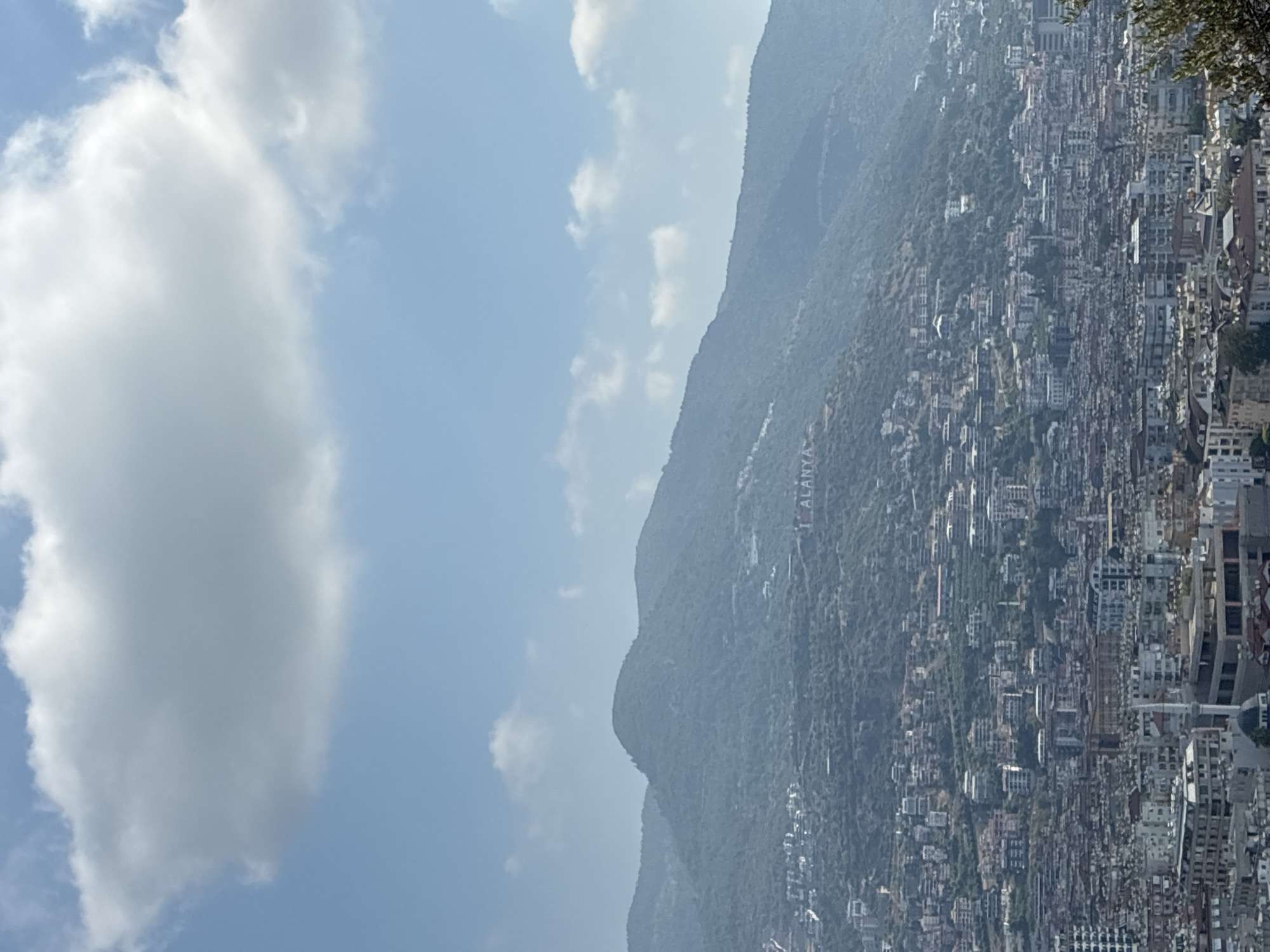 Morning views over Alanya's hillside cityscape from an elevated terrace