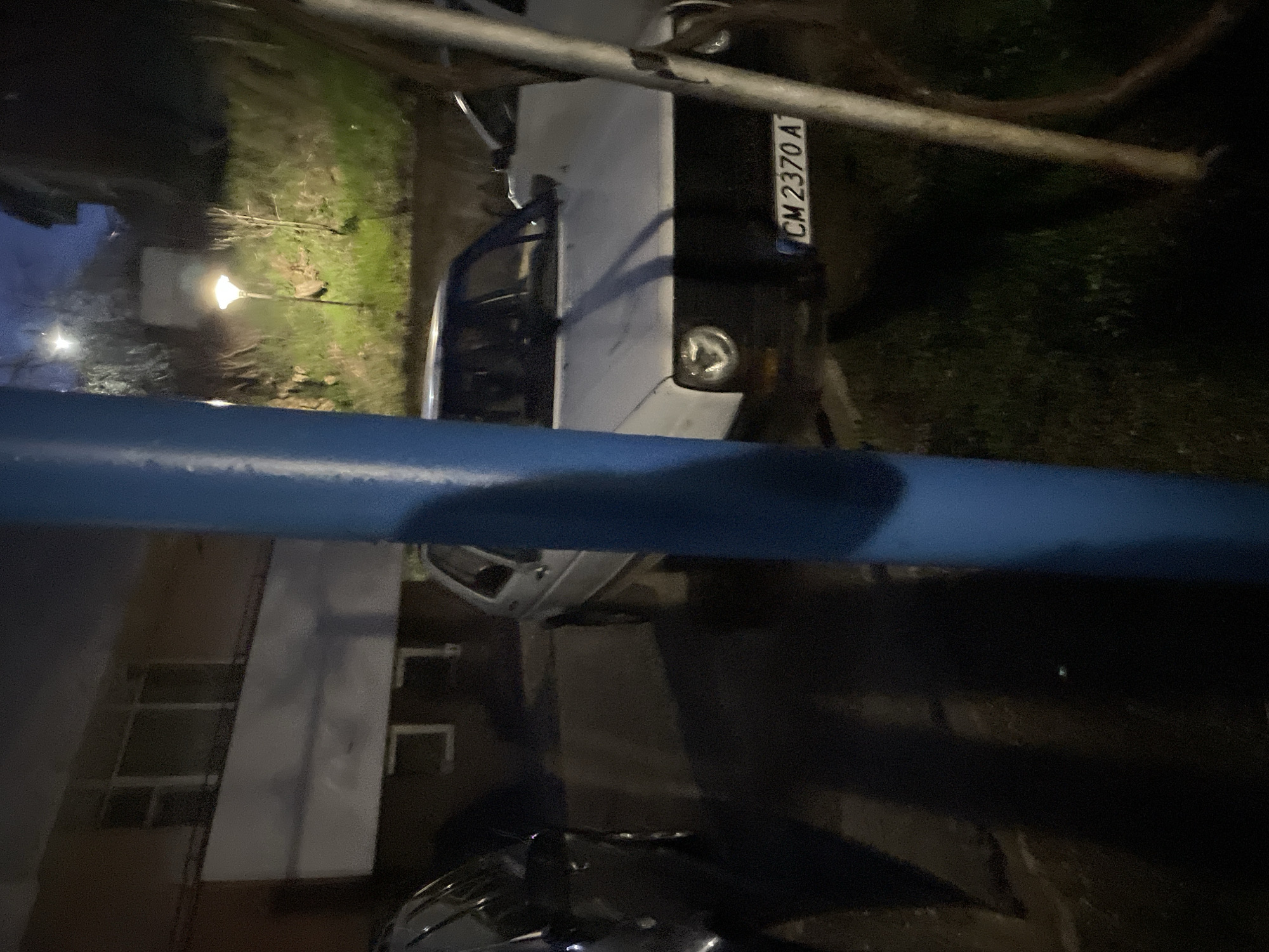 White Lada parked on Zlatograd street at night