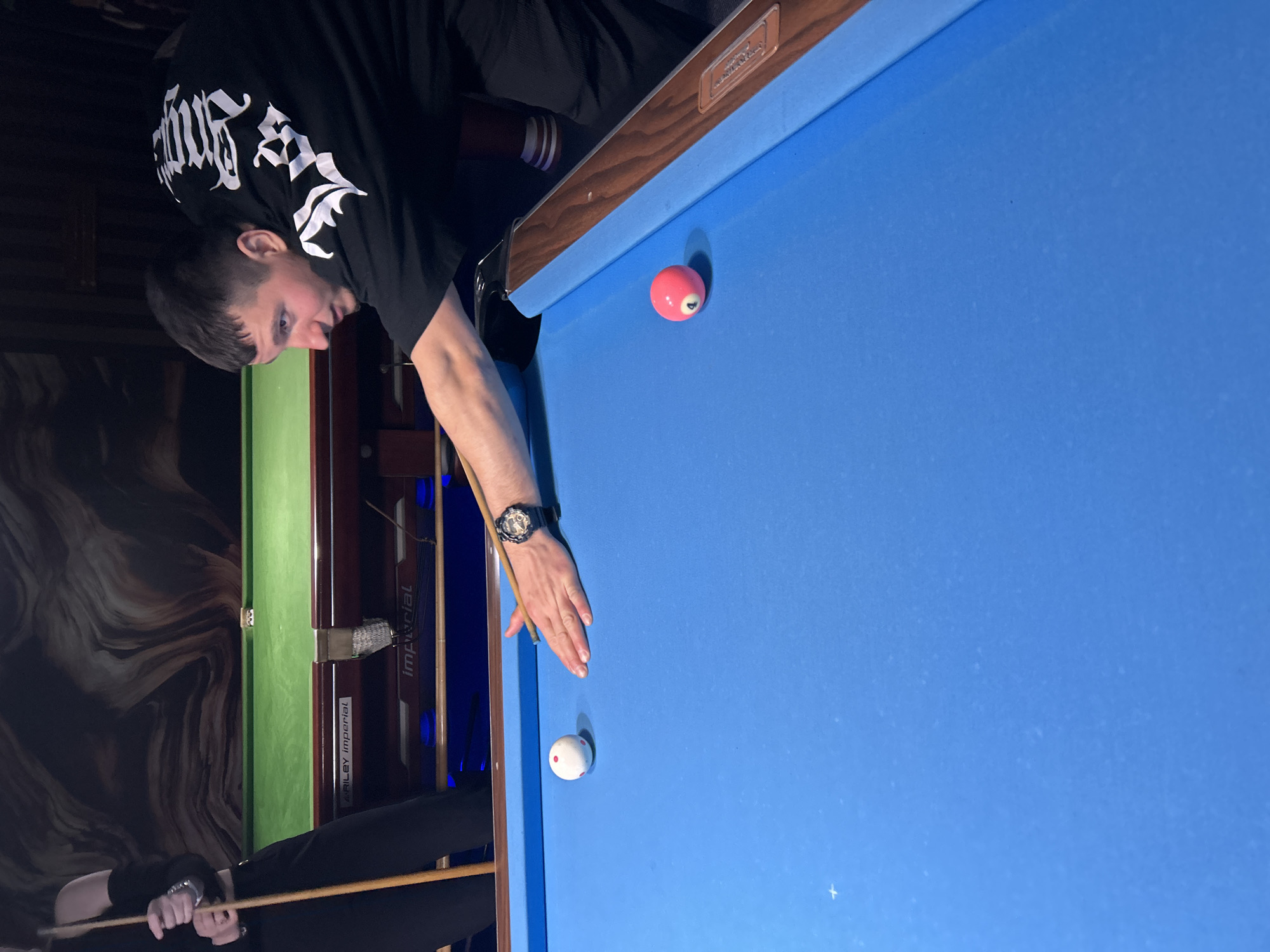 Man plays billiards in Haskovo, Bulgaria
