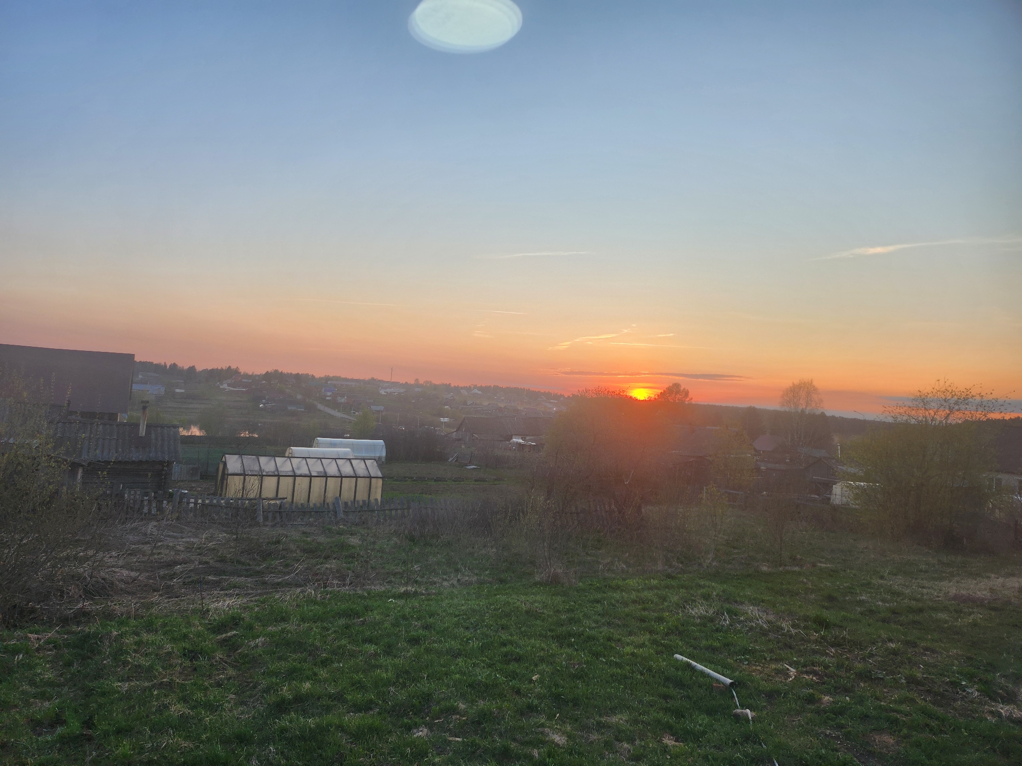 Sunset and cake documented in Russian village