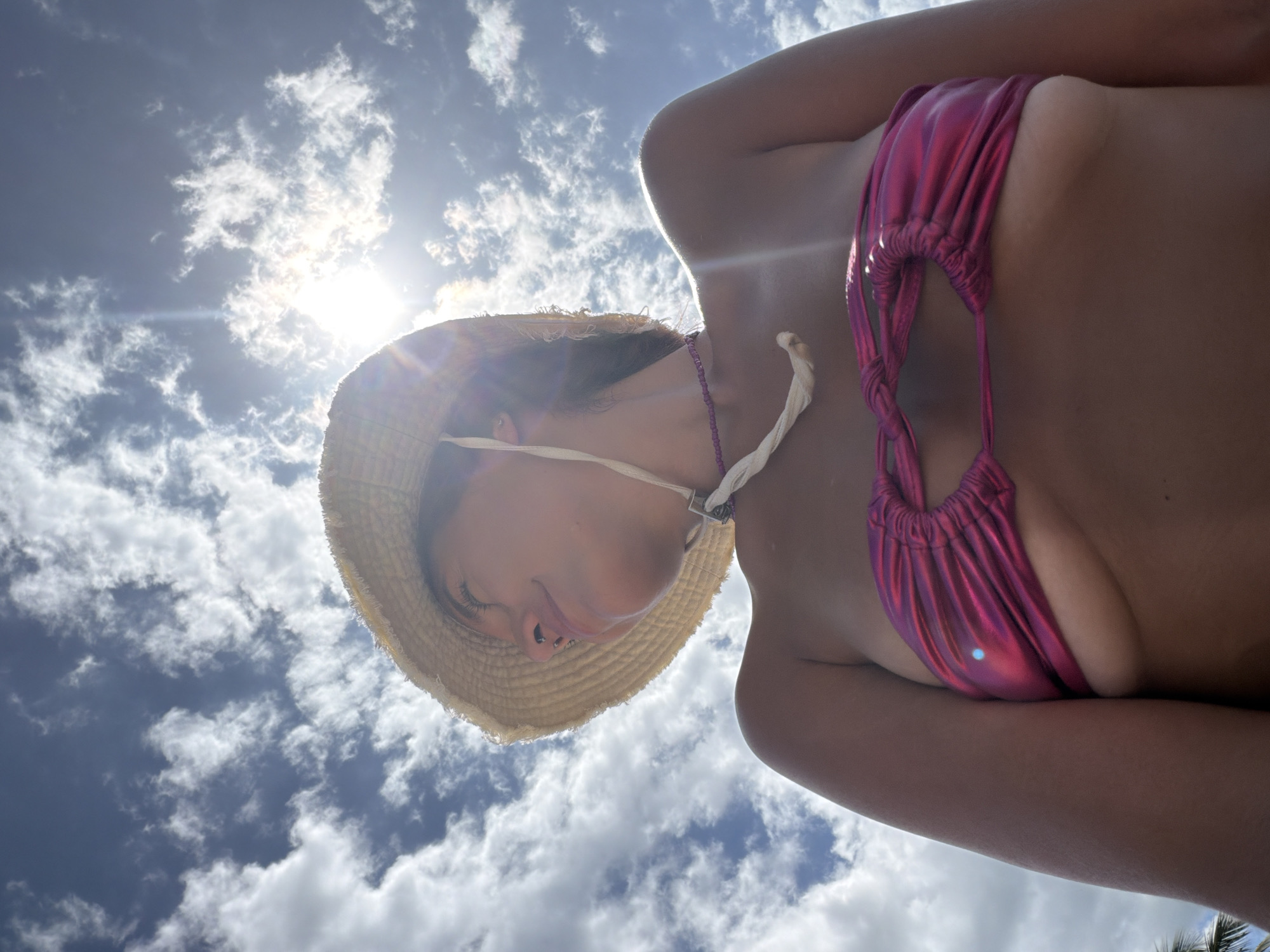 Beachgoer sunbathes at Arugam Bay during morning hours