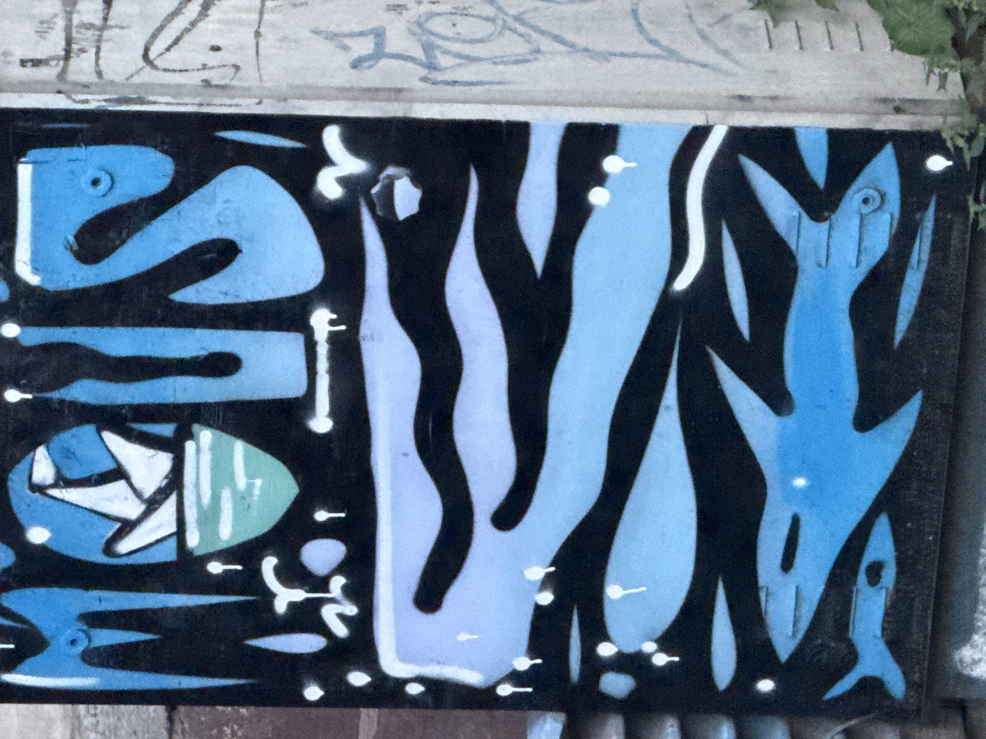 Urban street art and everyday moments documented during afternoon