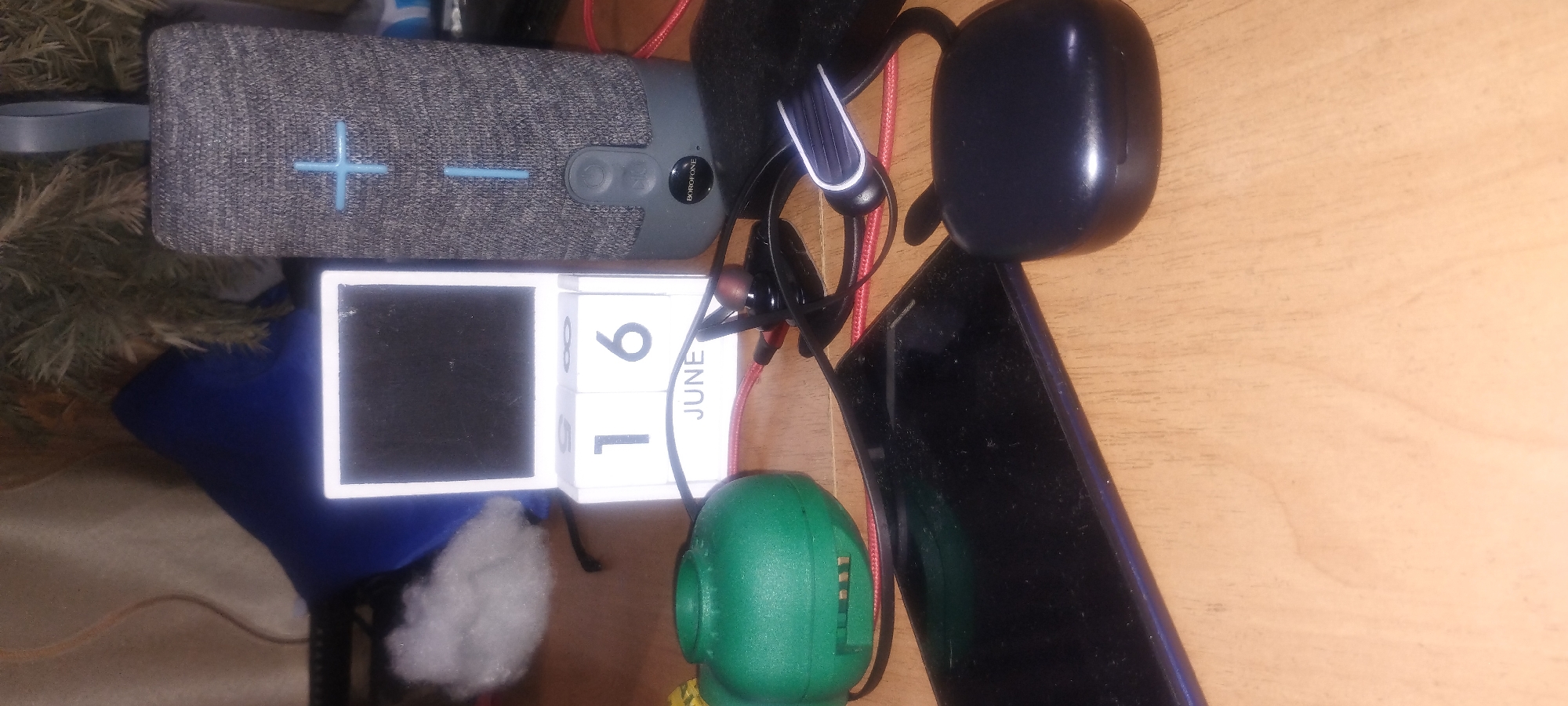 Cats, gadgets, and TMNT erasers in a casual indoor setting