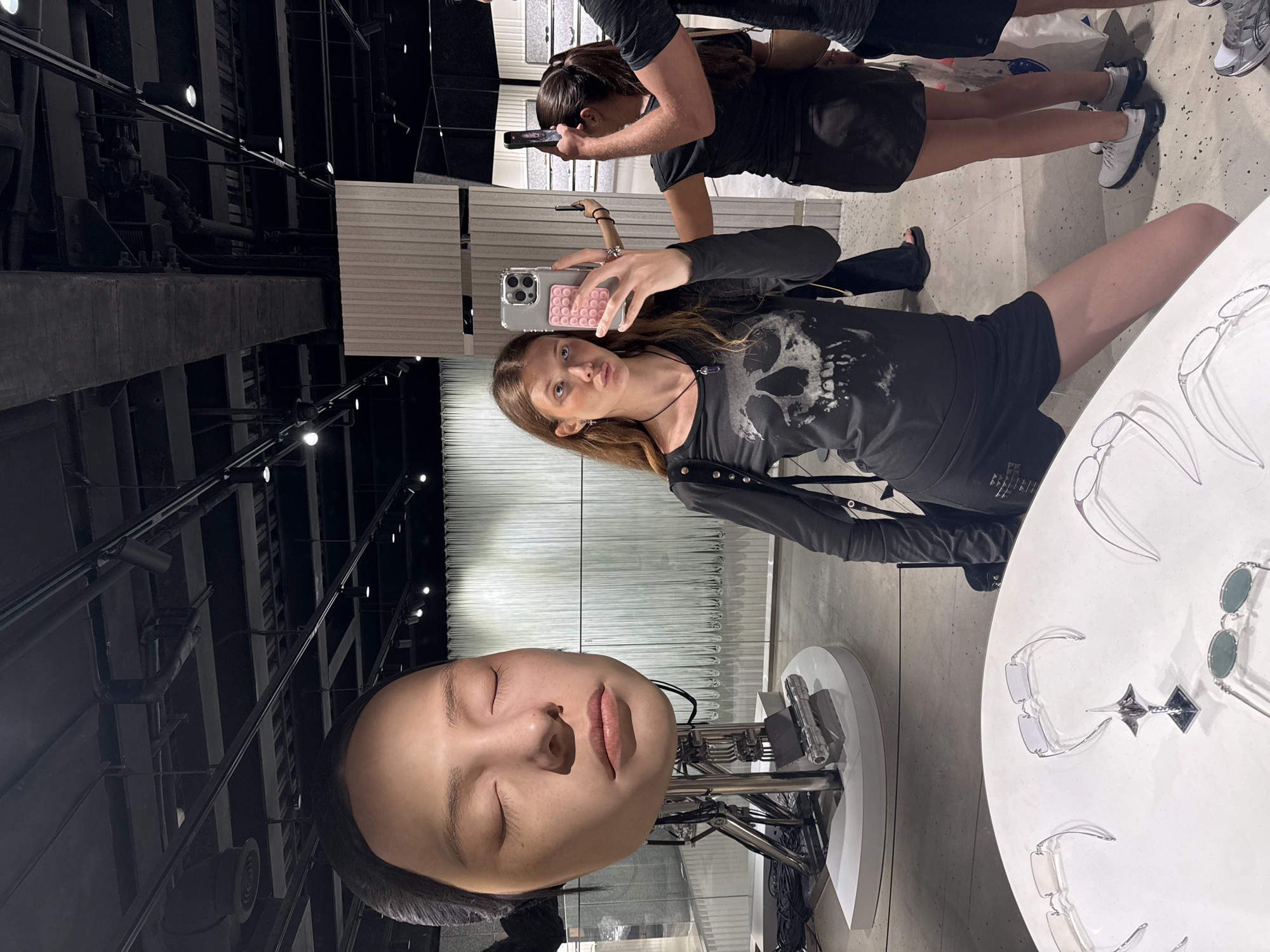 Woman visits Shanghai art gallery featuring hyperrealistic sculptures