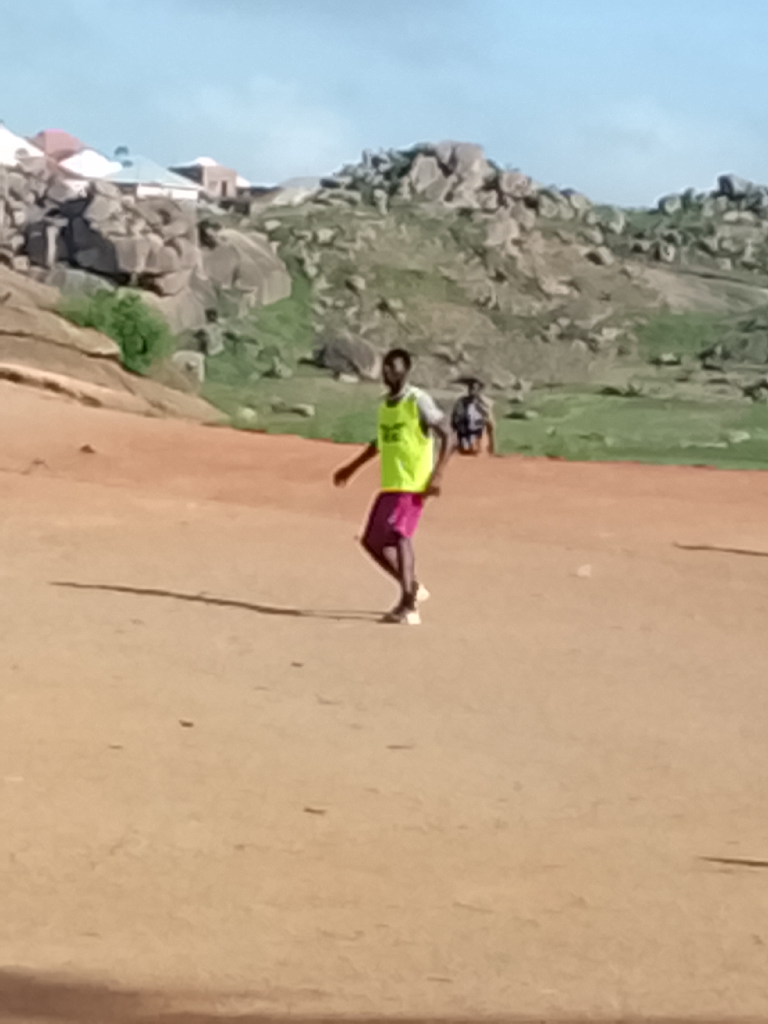 Soccer training session on a dirt pitch in Jos, Nigeria
