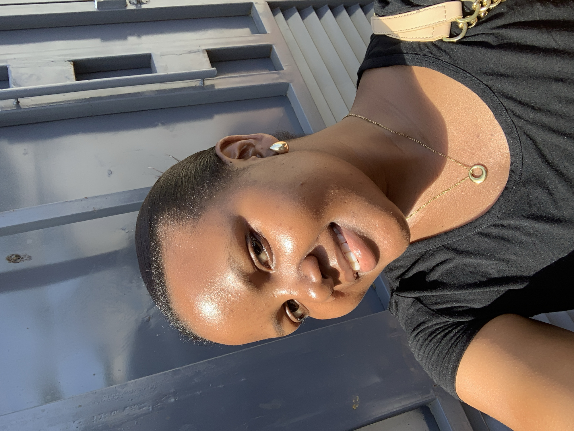 Casual outdoor selfie session in Dar es Salaam