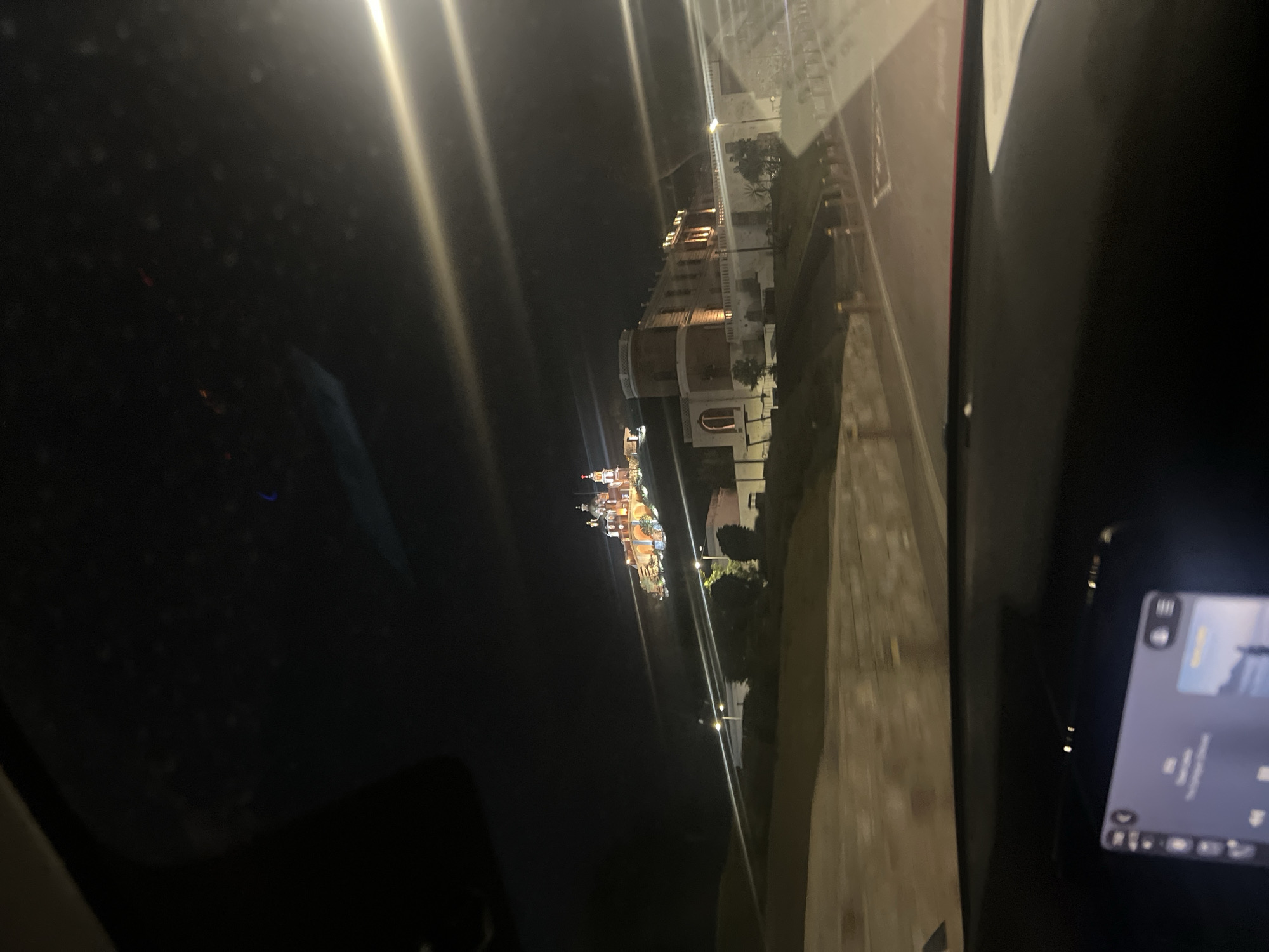 Nighttime drive through San Andrés Cholula captures lit streets