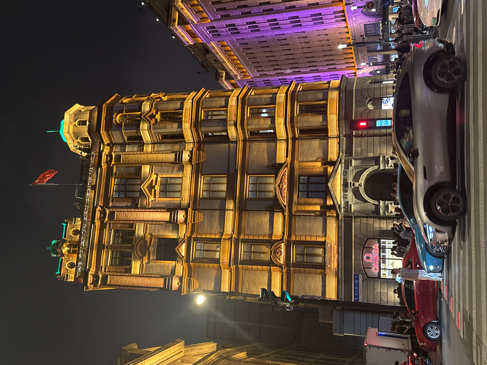 Evening crowds gather at illuminated Shanghai Bund waterfront district