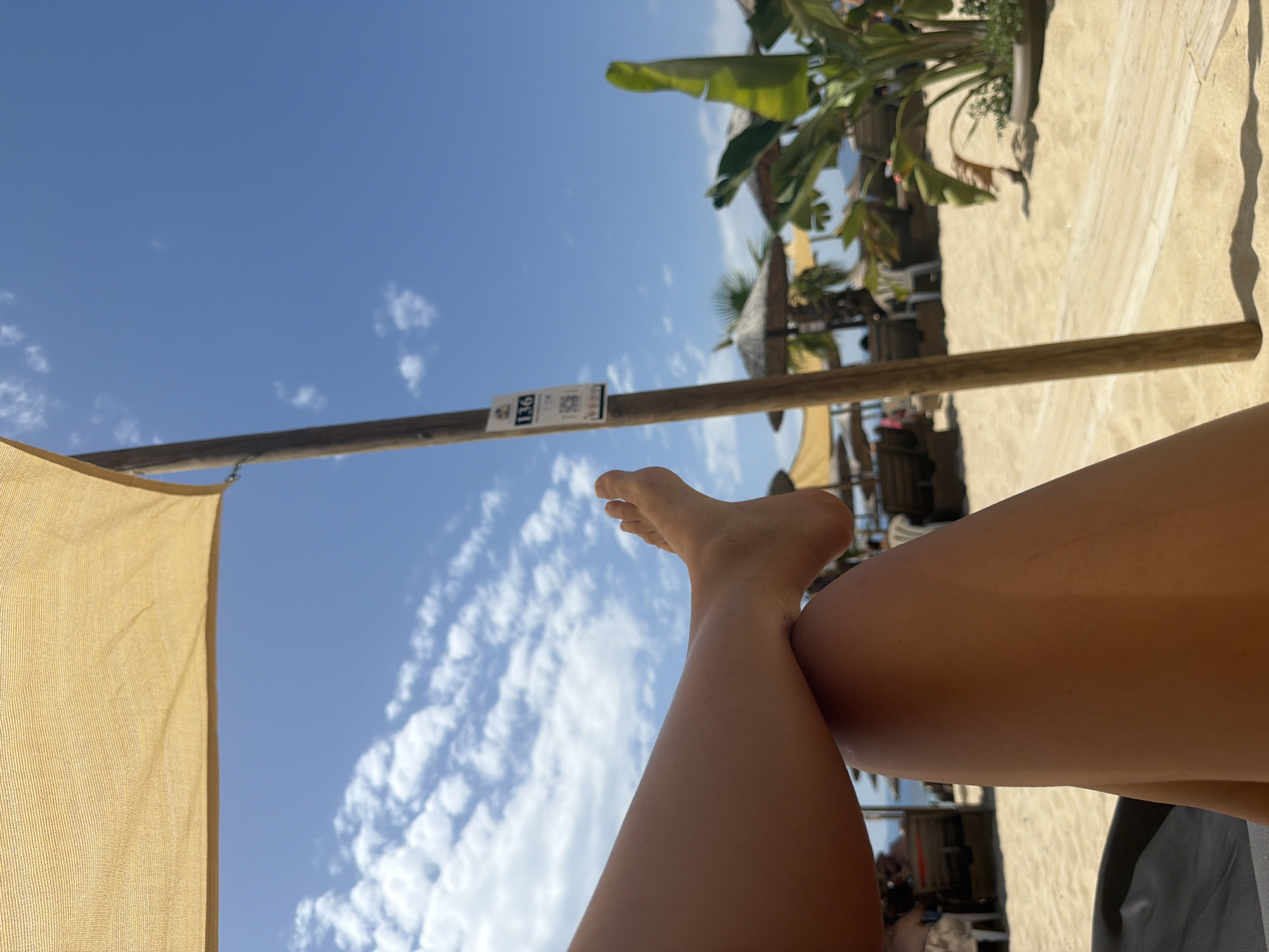Kicking back on a lounger at Ofrynio Beach, Greece