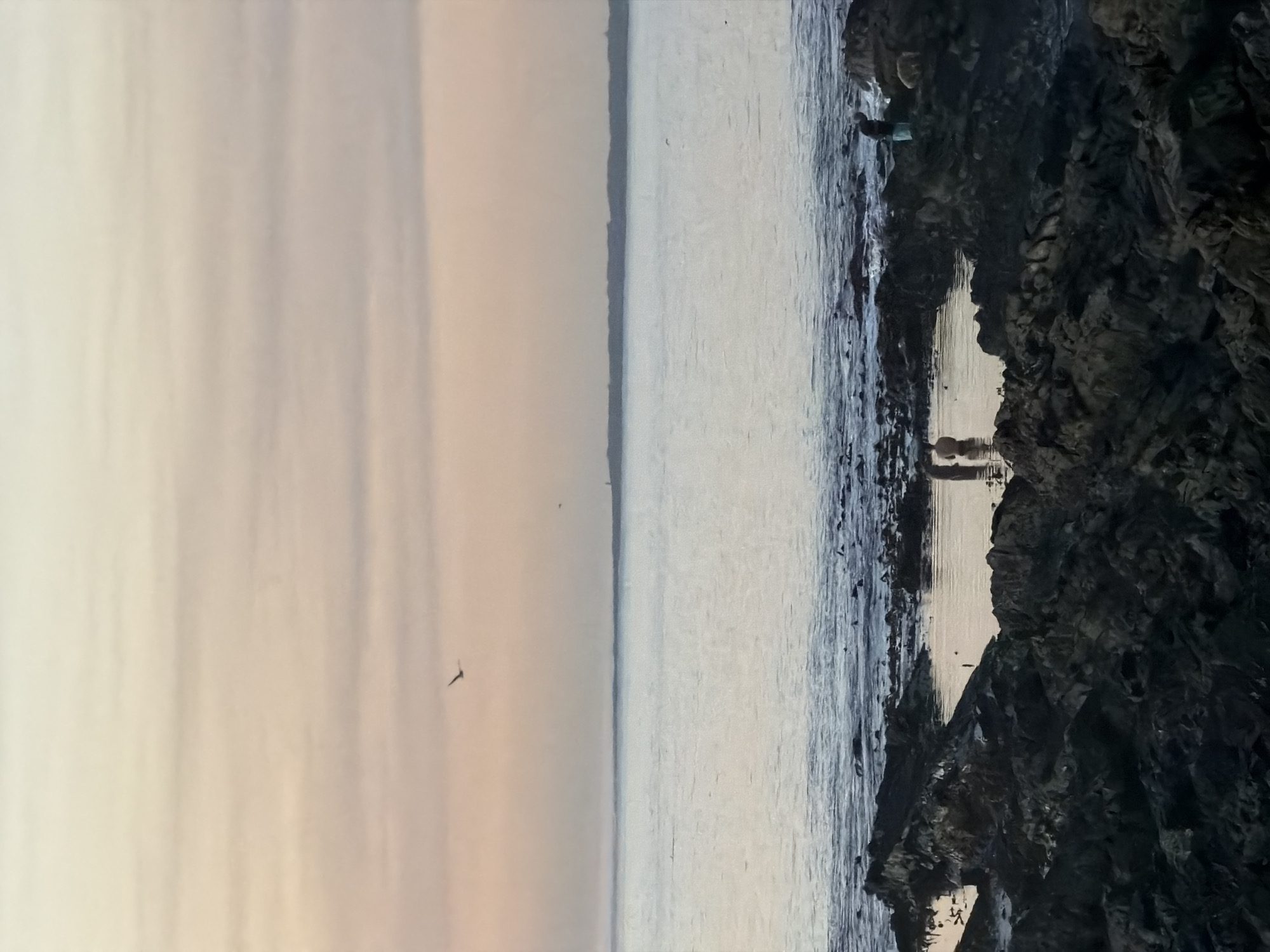 Cape Town residents enjoy sunset stroll along coastal promenade