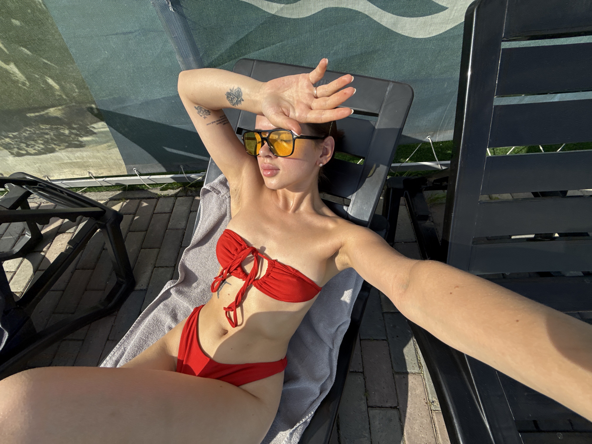 Woman sunbathes, takes selfies at Russian pool facility