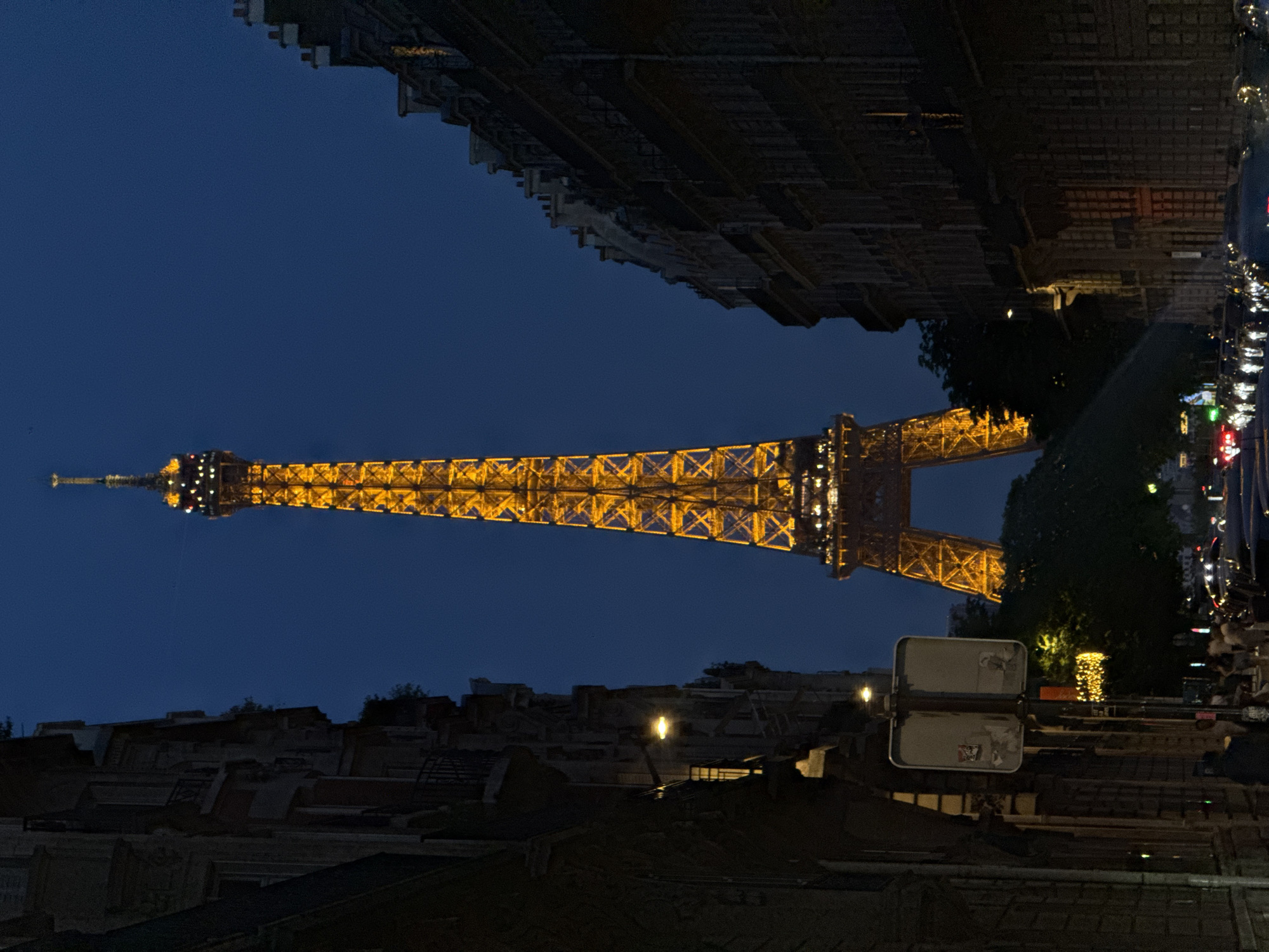 Eiffel Tower glowing at dusk, Paris streets at golden hour