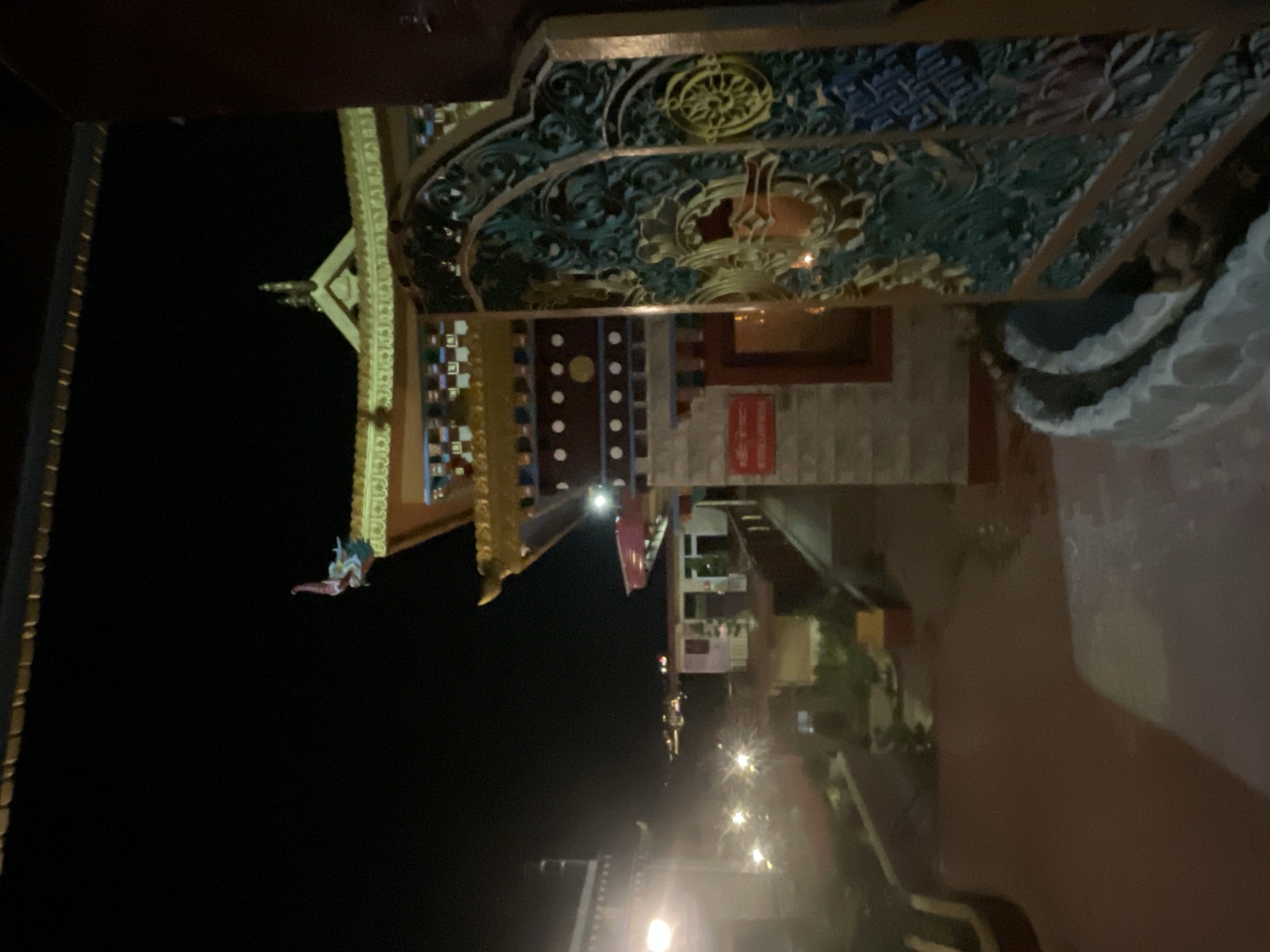 Ornate building with golden accents photographed in Dharamshala