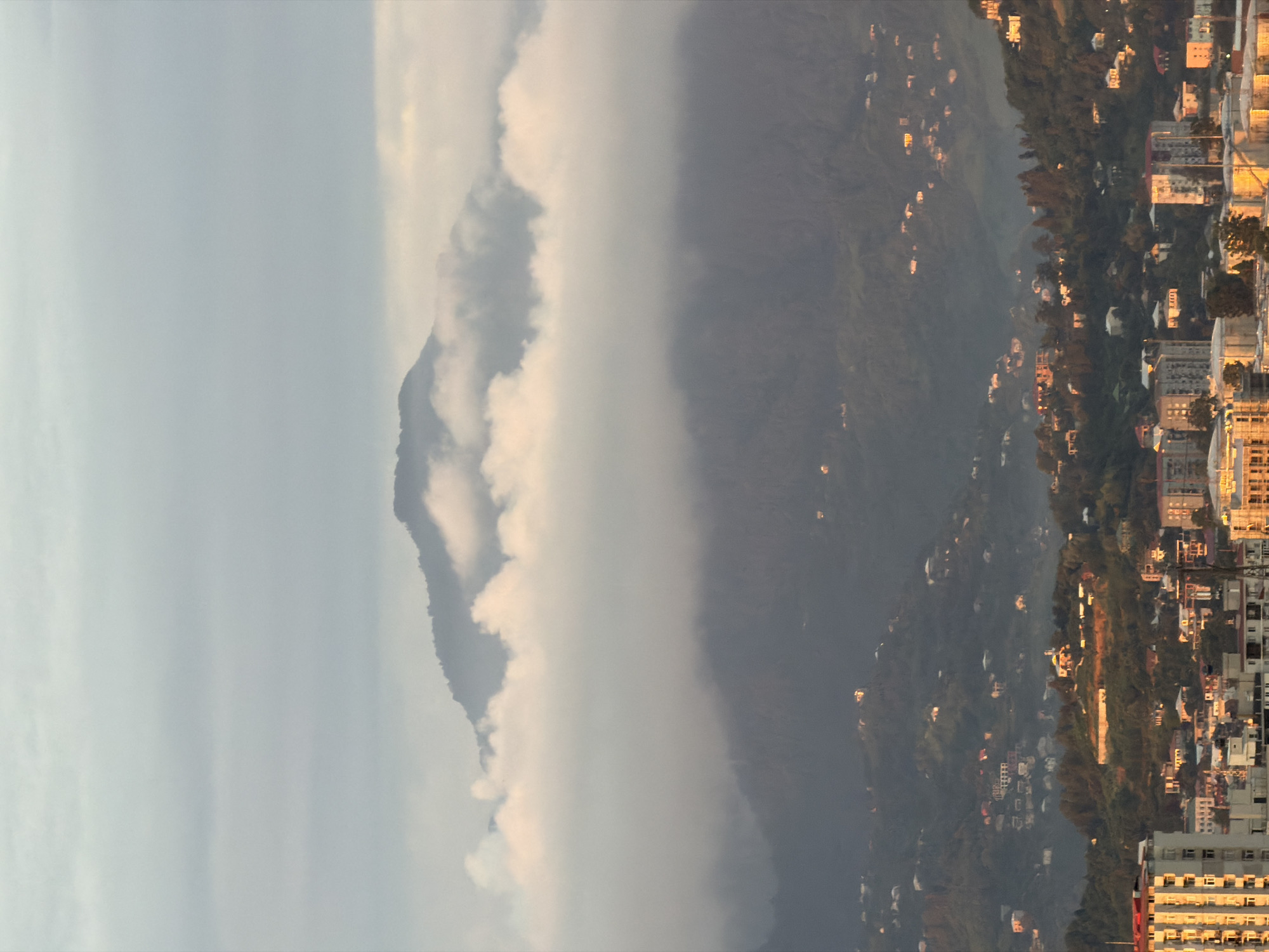 Batumi panorama at golden hour, city and mountains in view