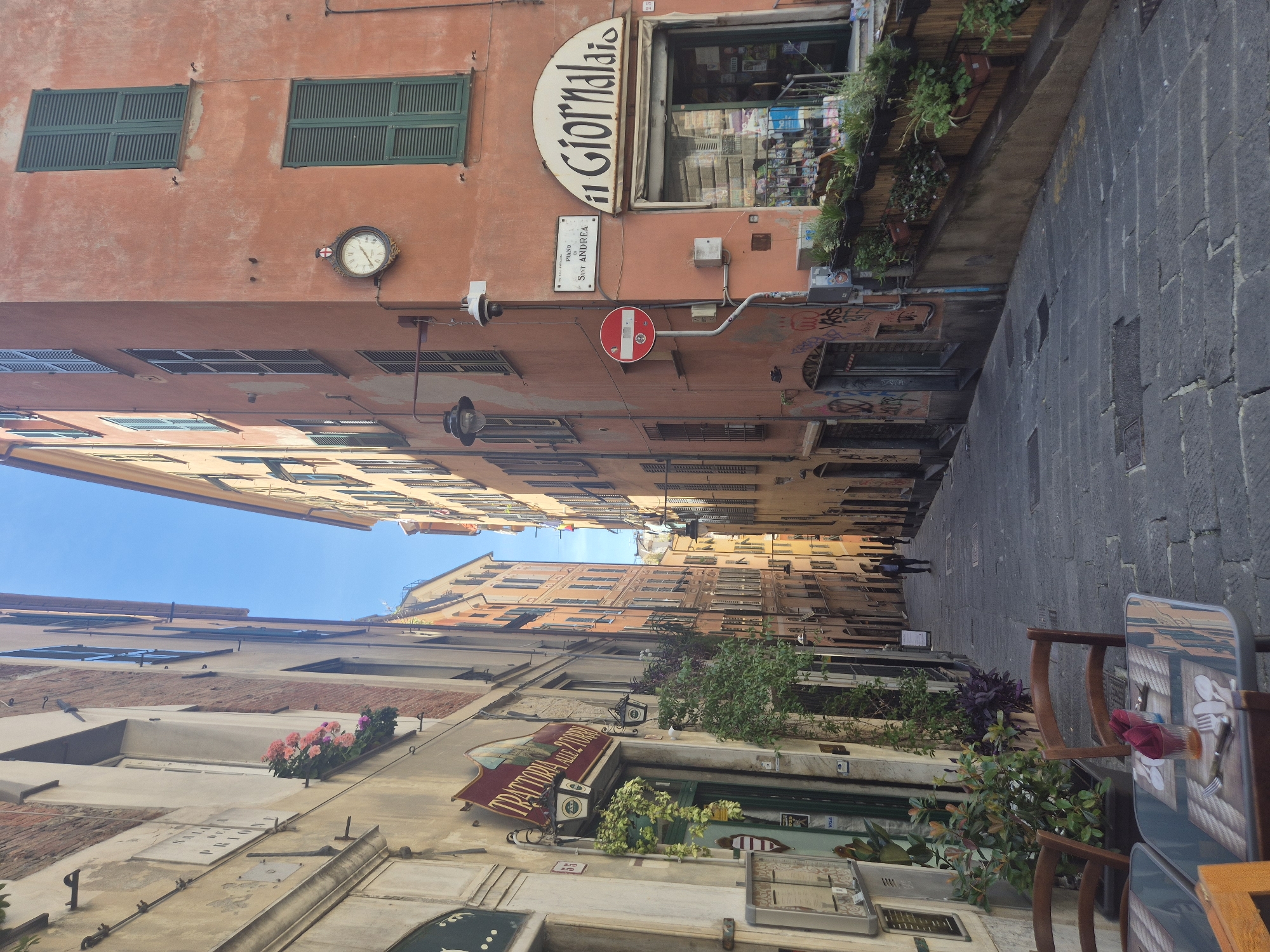 Street scenes documented in narrow Genoa thoroughfare