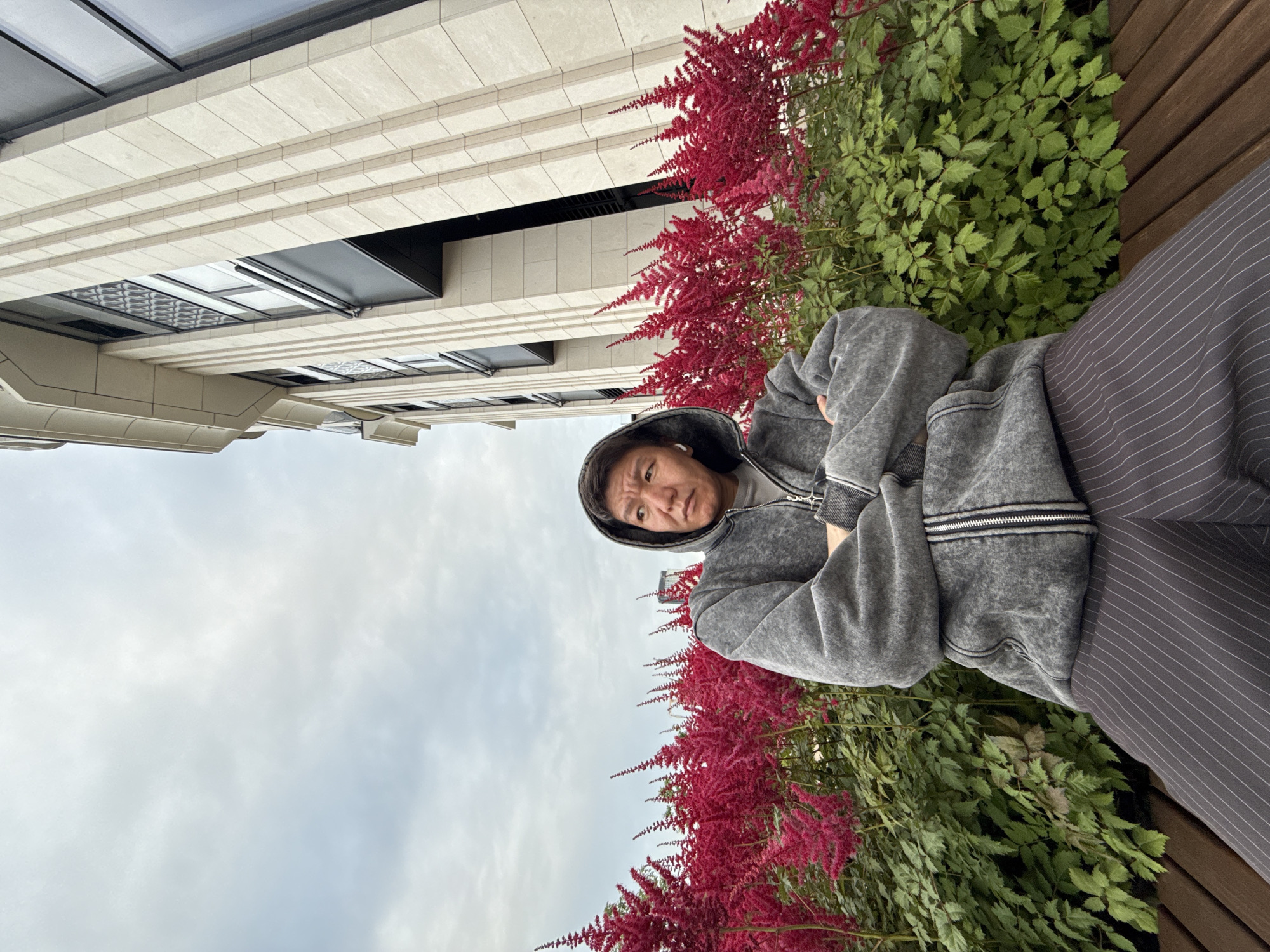 Afternoon break beside red astilbe flowers in Khimki