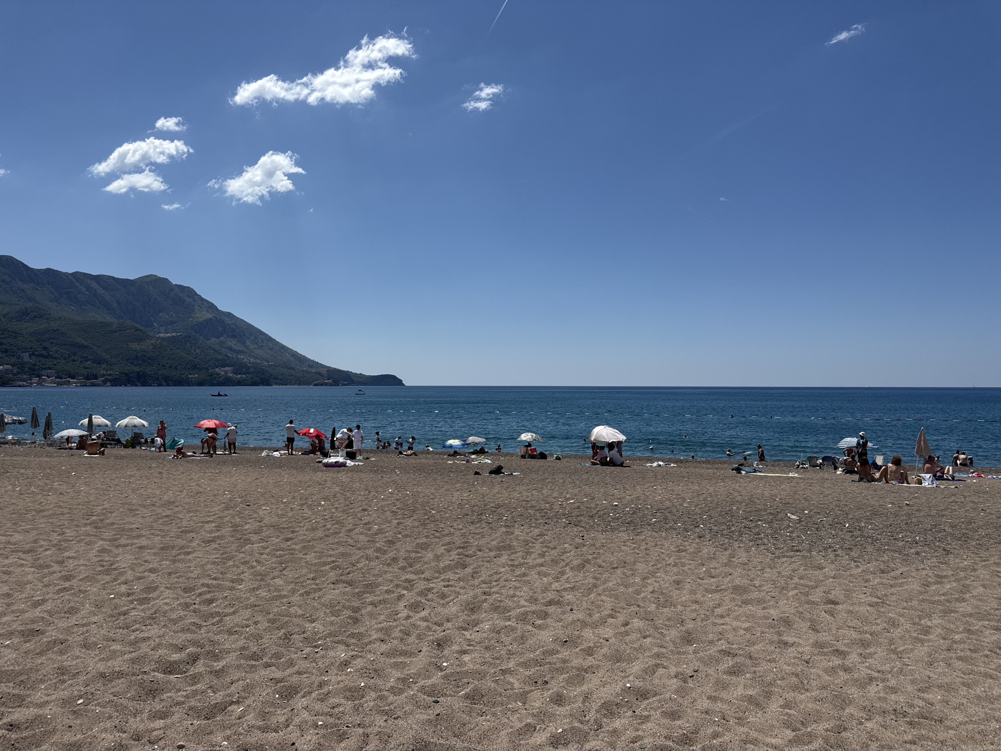 Summer morning along Montenegro's Budva Riviera beaches and streets