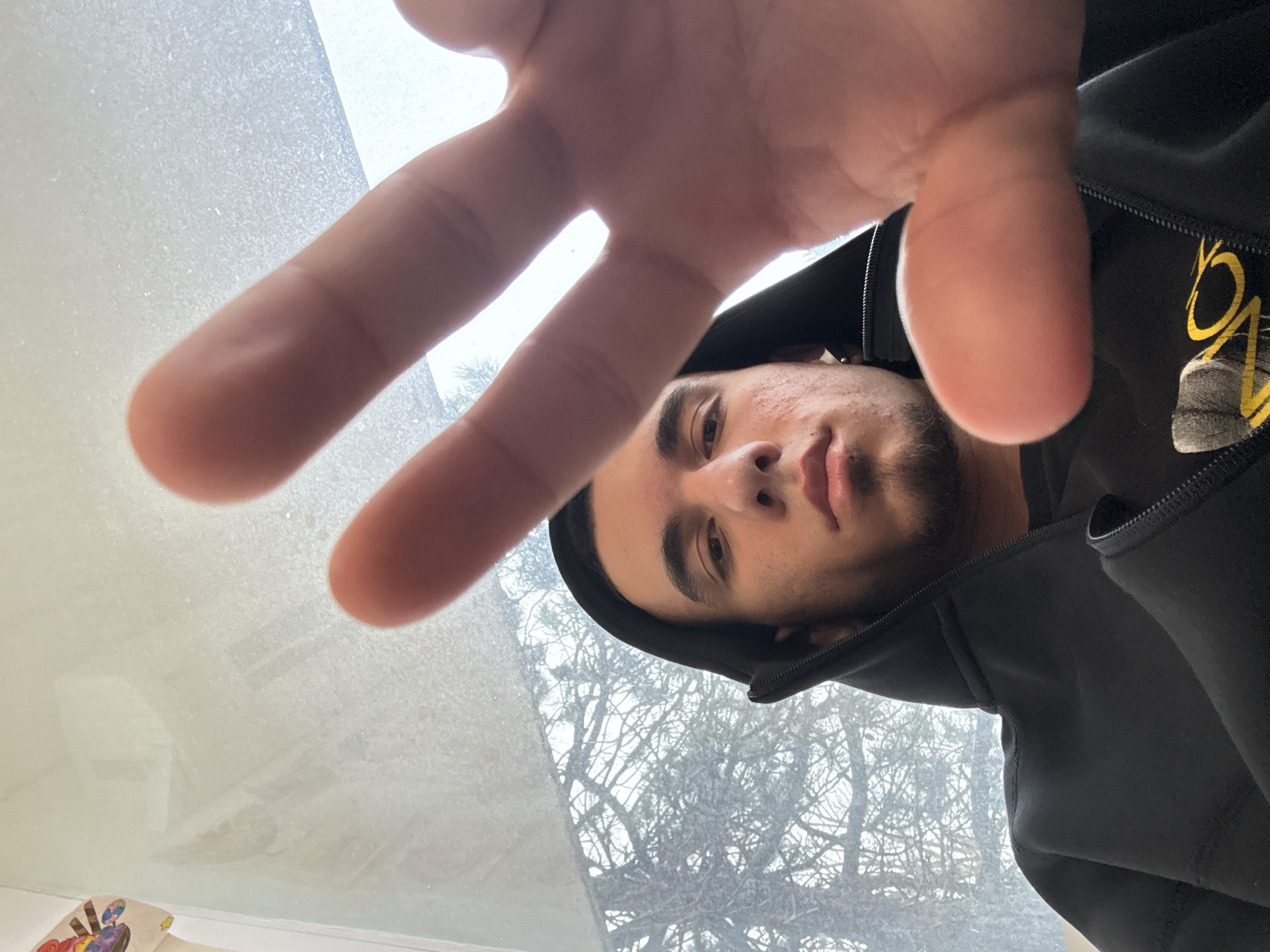 Young man takes selfie outdoors in Dobrich, Bulgaria