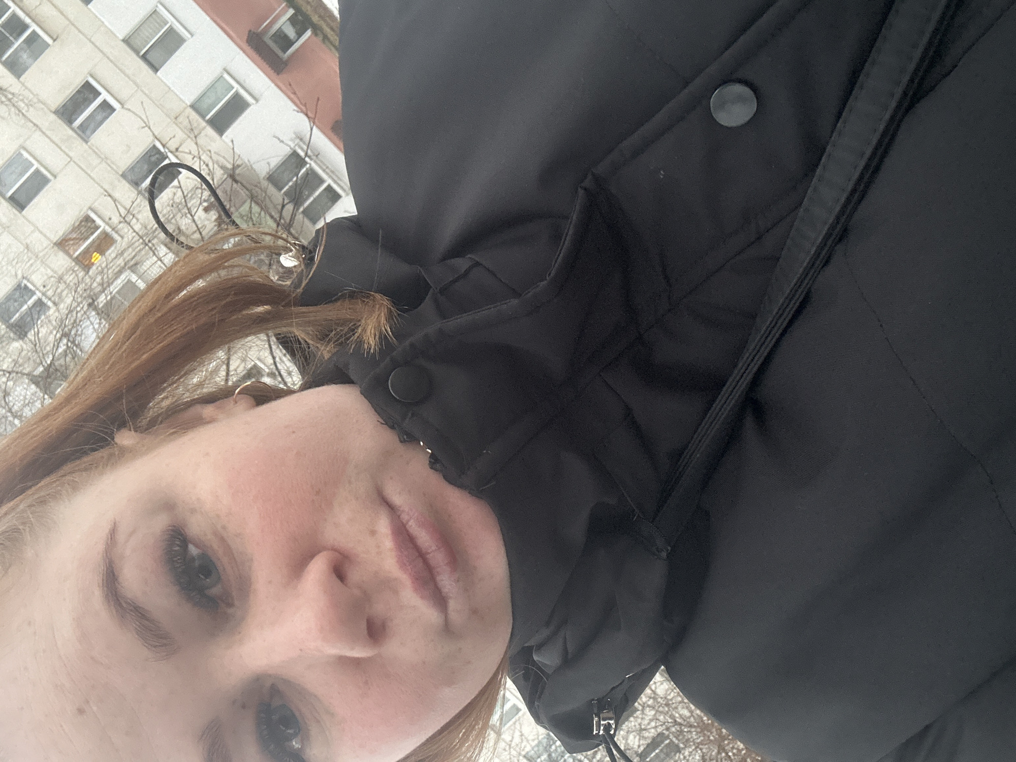 Early morning selfie captured on snowy Chaikovsky sidewalk