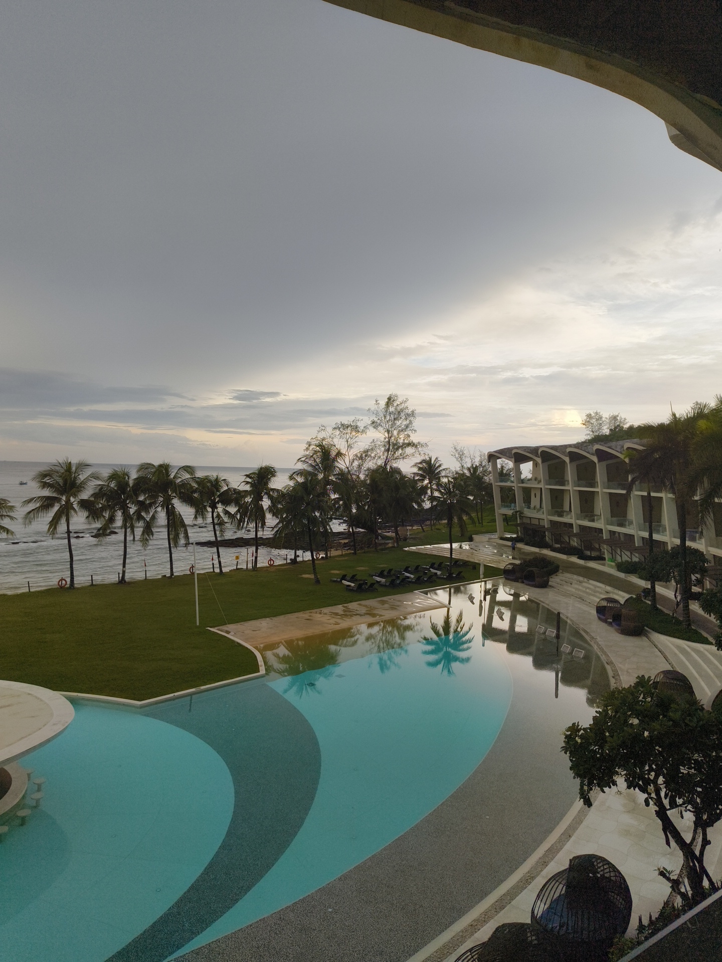 Phú Quốc resort pool with ocean views and sunken bar