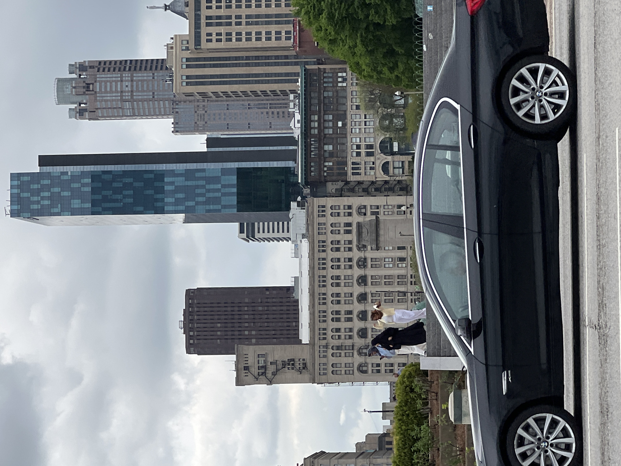 Vehicles parked on Chicago street amid urban landscape