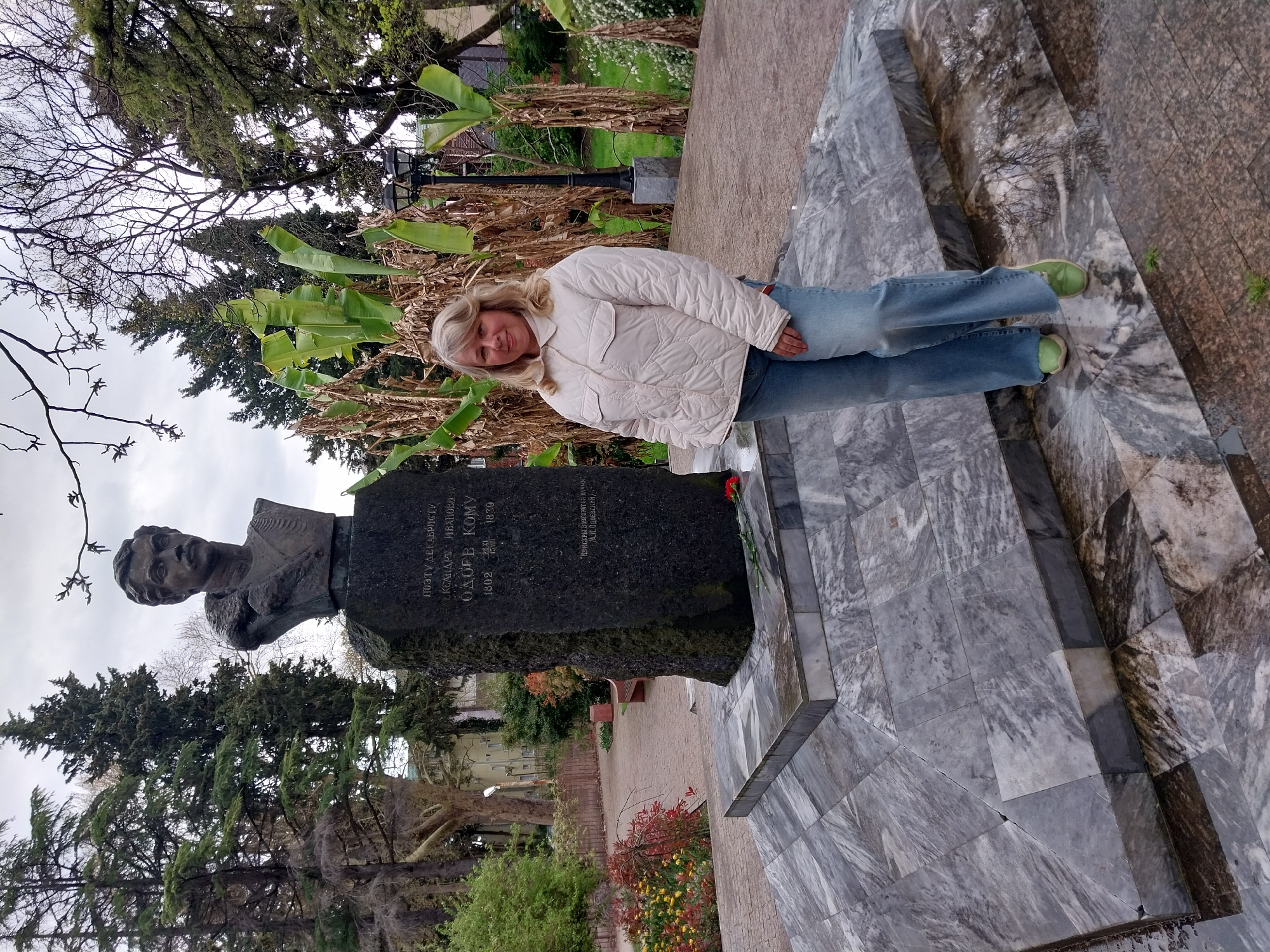 Woman visits Alexander Odoevsky poet monument in Sochi