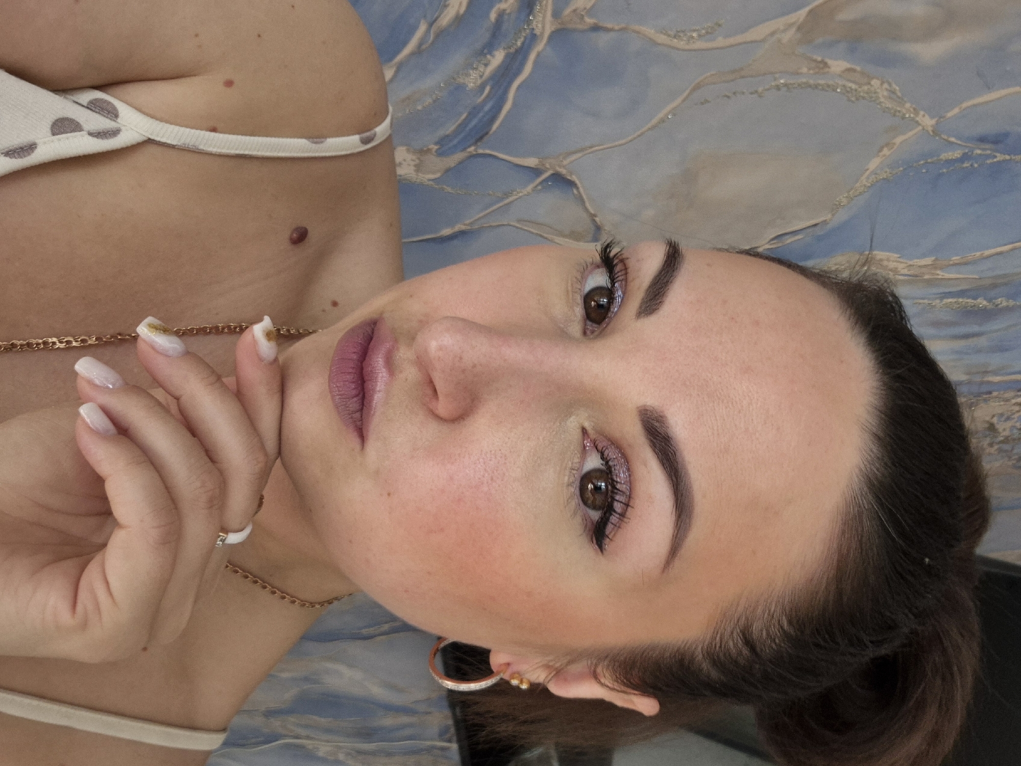 Woman photographed in close-up portrait at unknown location