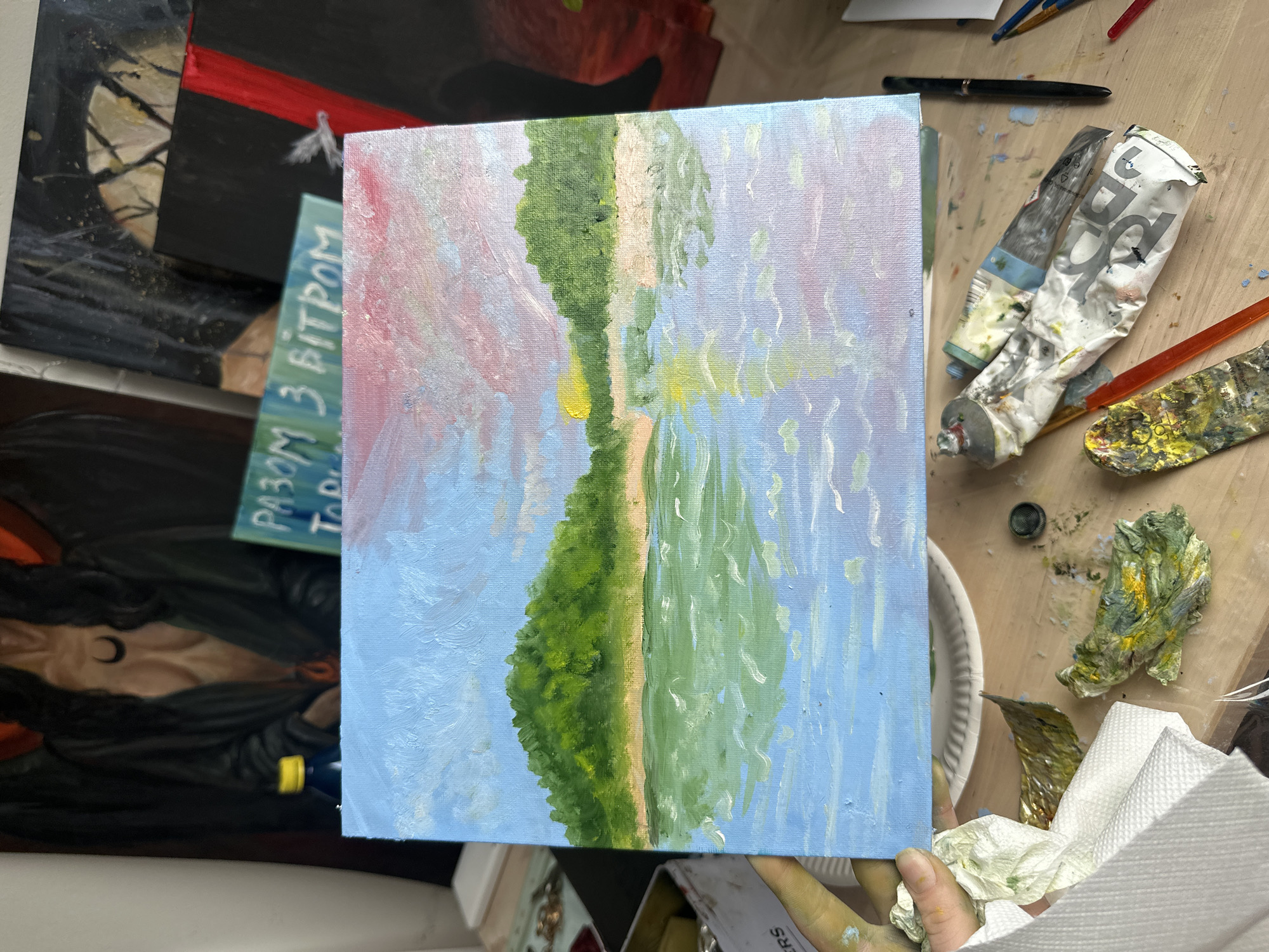 Inside a working Prague art studio, paintings in progress