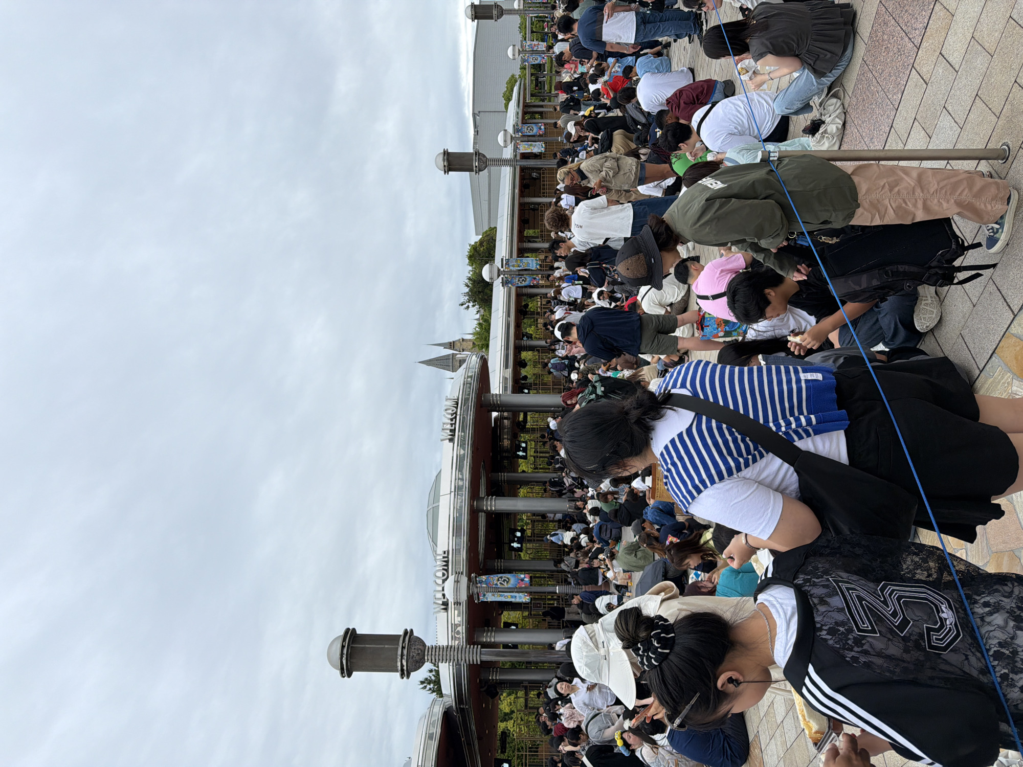 Crowds gather at Universal Studios Japan during evening hours
