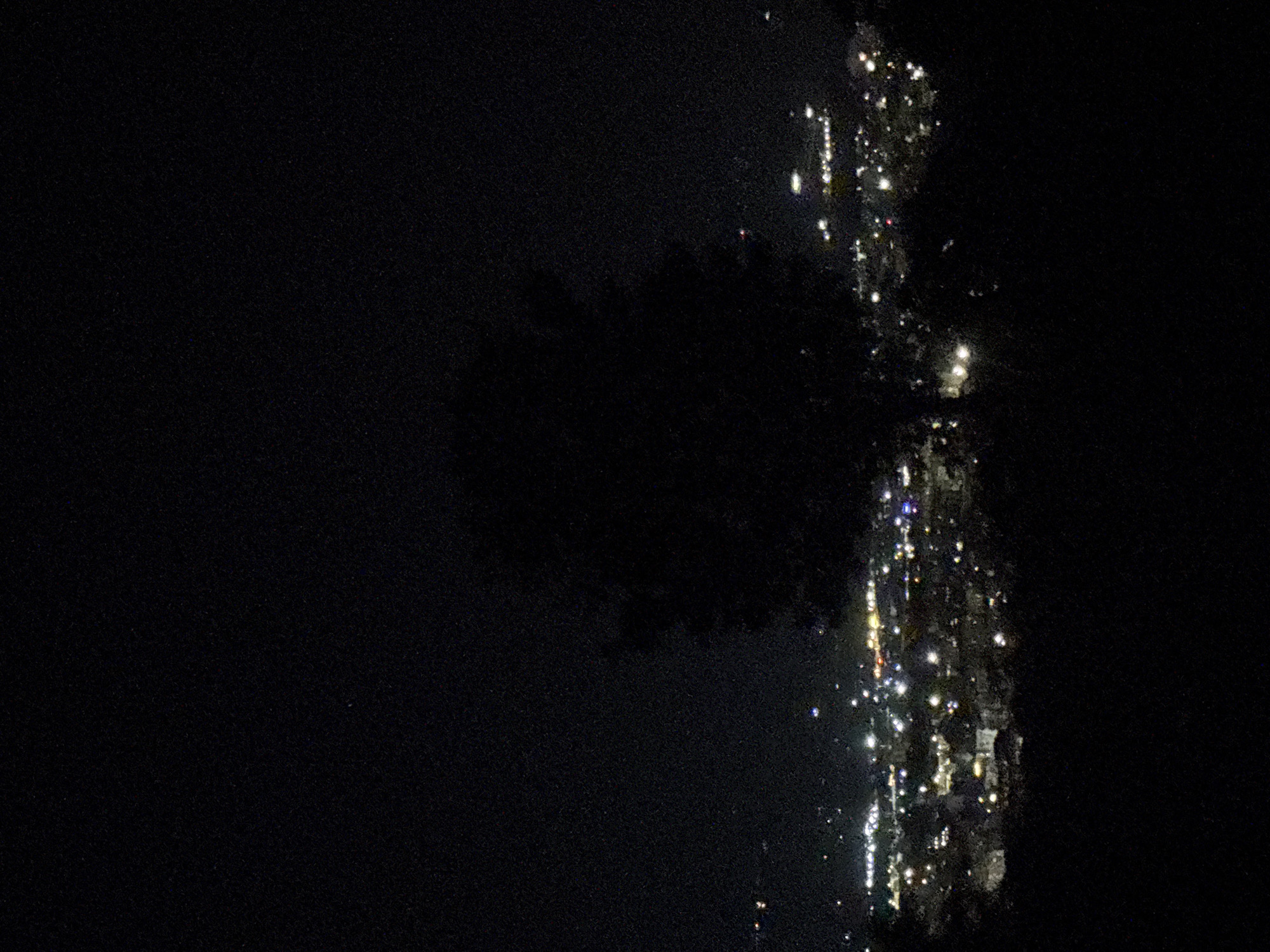 Lights reflect on water during night in Marulevo Bulgaria