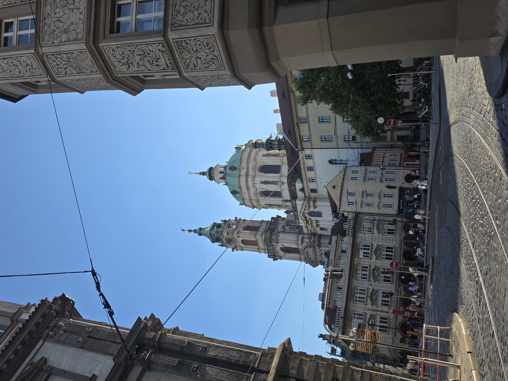 Prague church and white peacock captured in European settings
