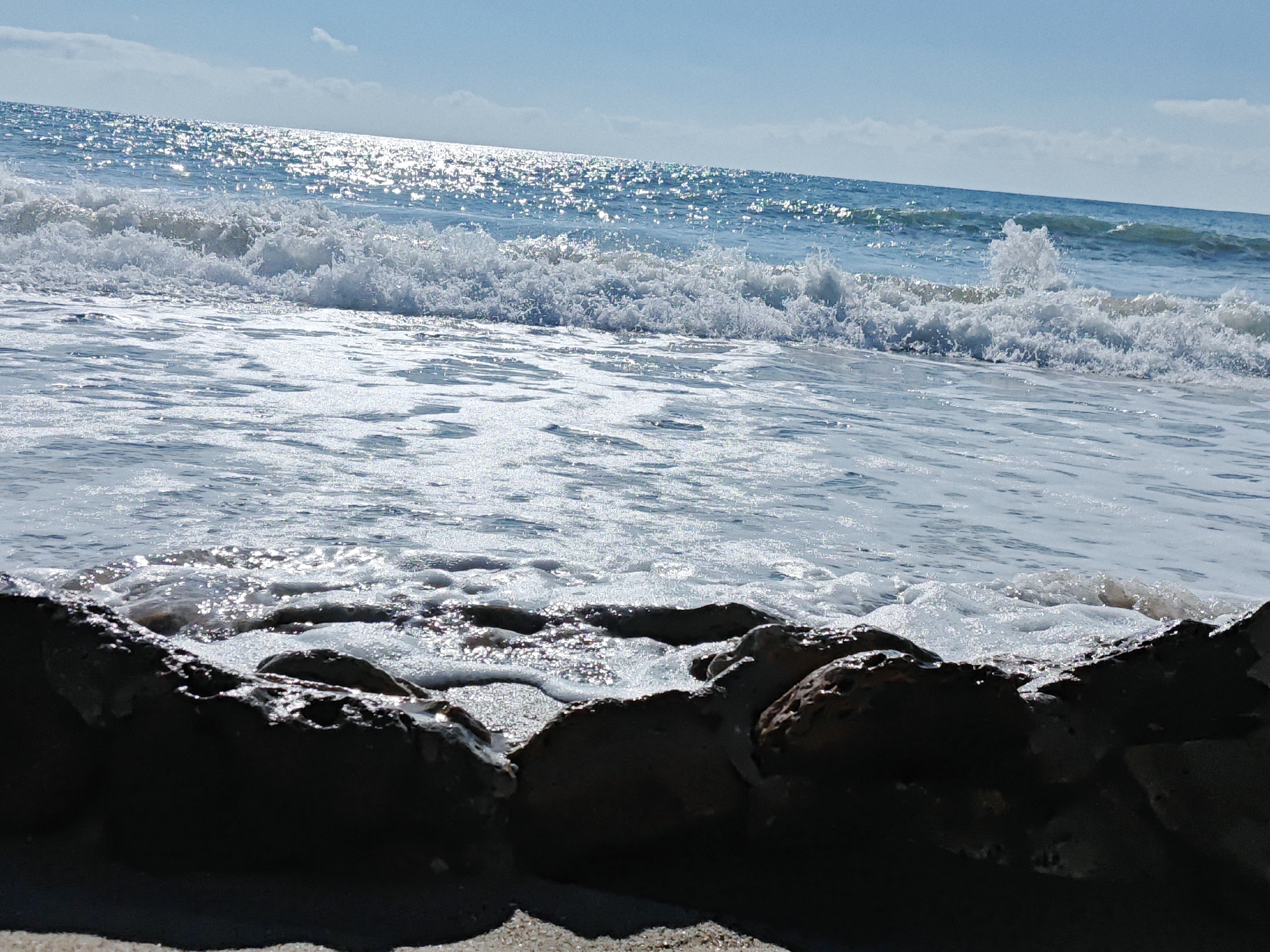 Sun, waves, and rocks: a beach morning from every angle
