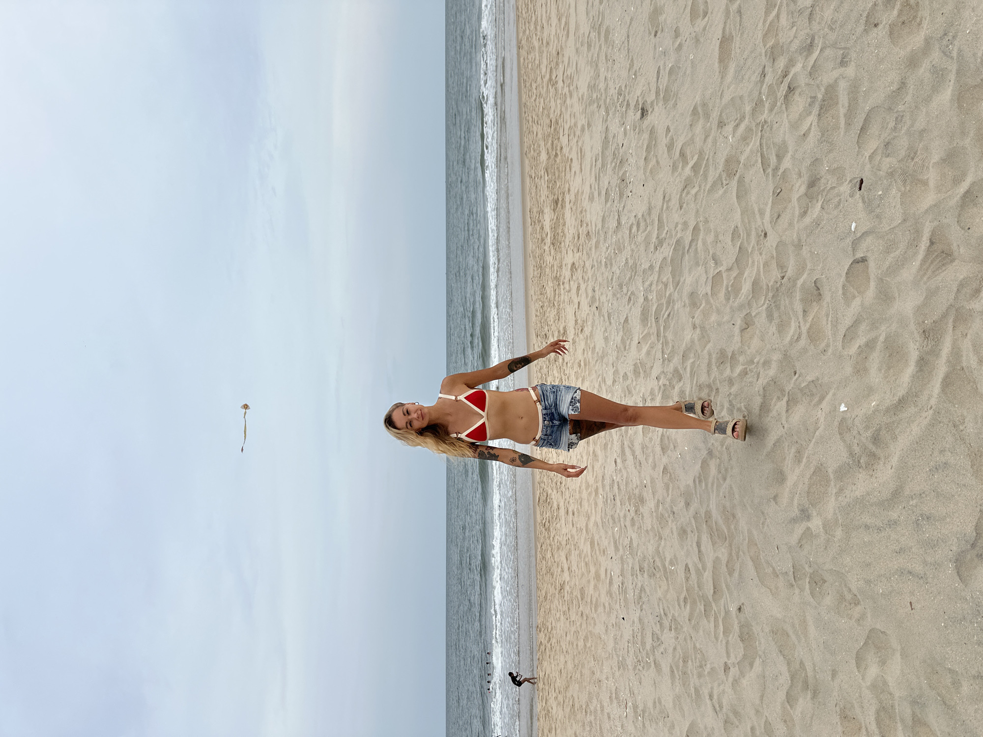 Two women enjoy morning beach time in Vietnam