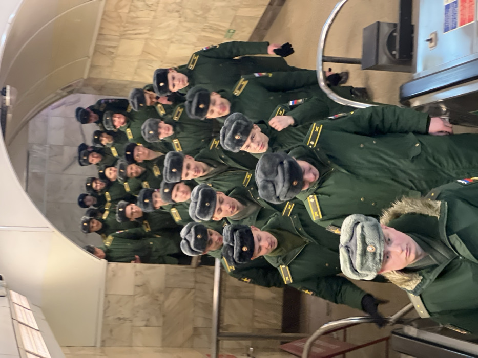 Military unit transits Saint Petersburg metro alongside civilian passengers