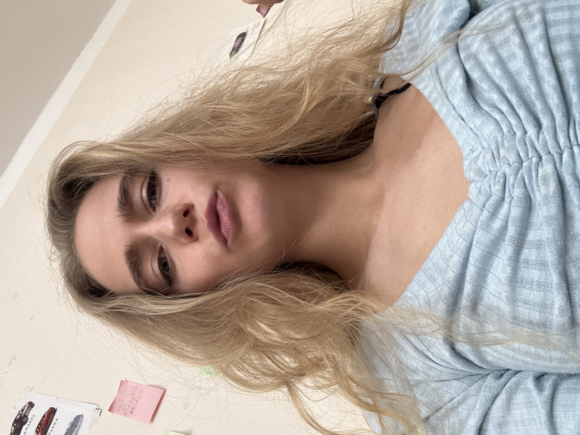 Blonde woman observed across multiple locations during morning hours