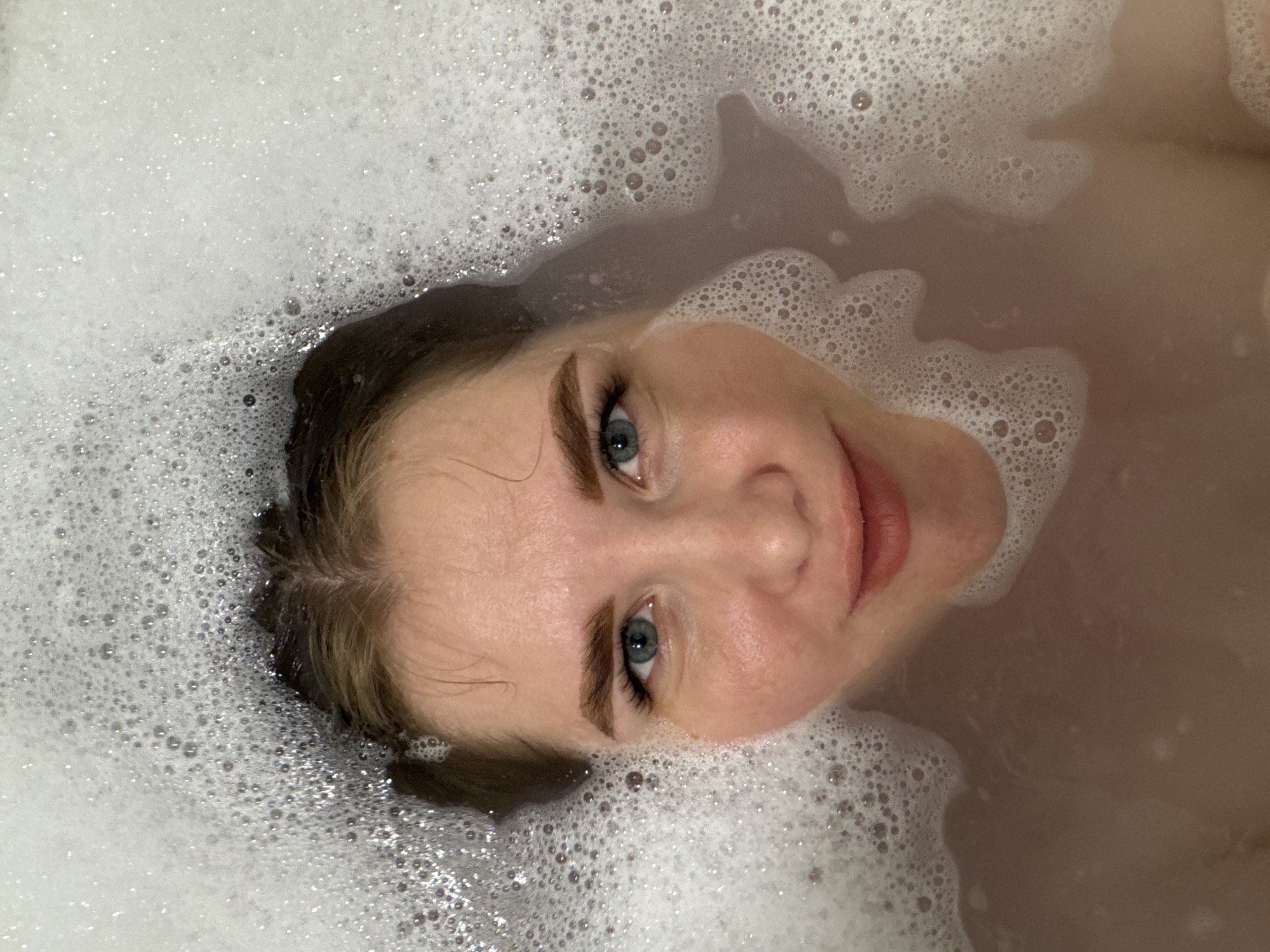 Woman's bath time documented in multiple recordings in Russia