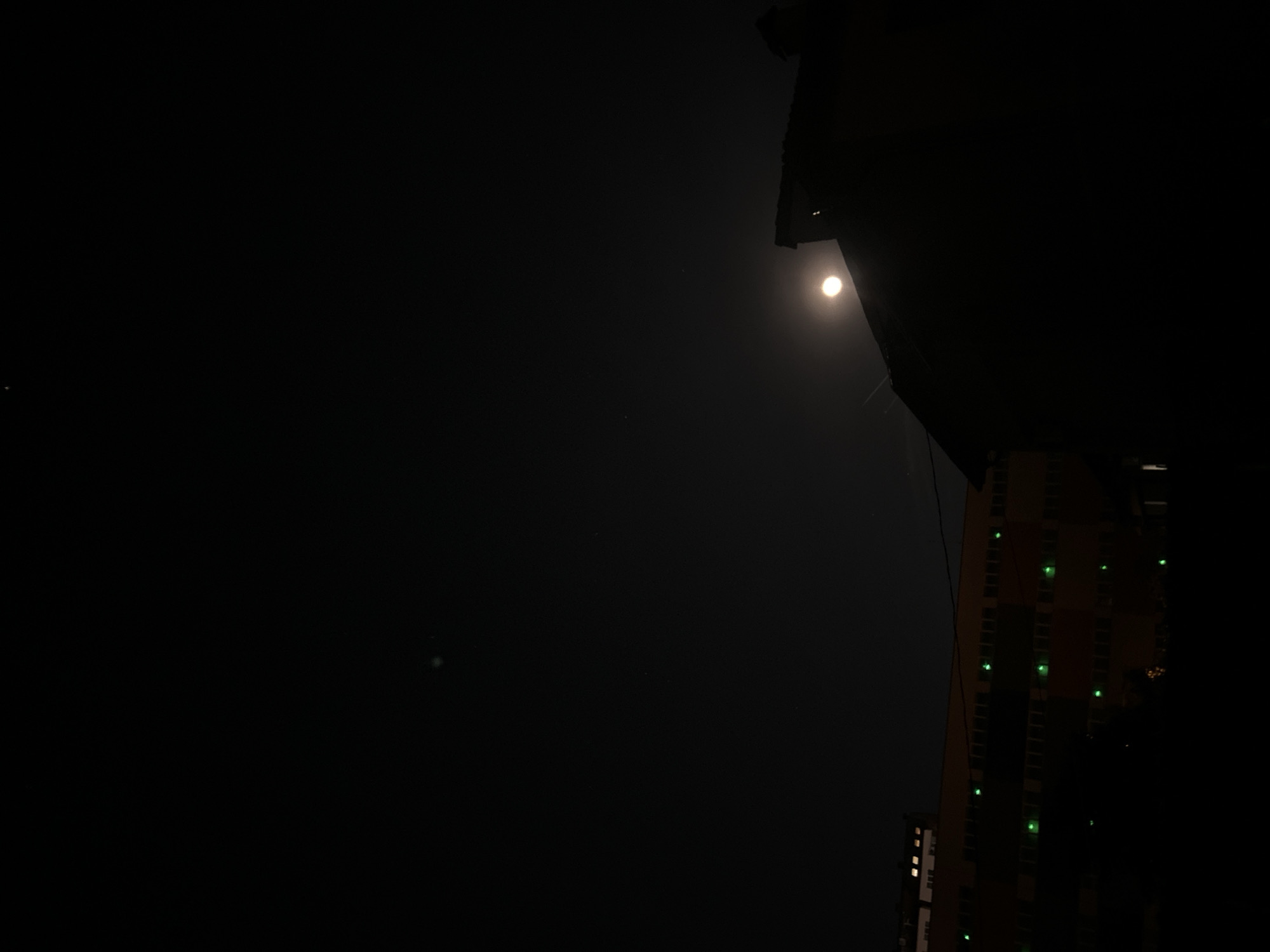 Nighttime documentation of Sofia cityscape and Mercedes vehicle