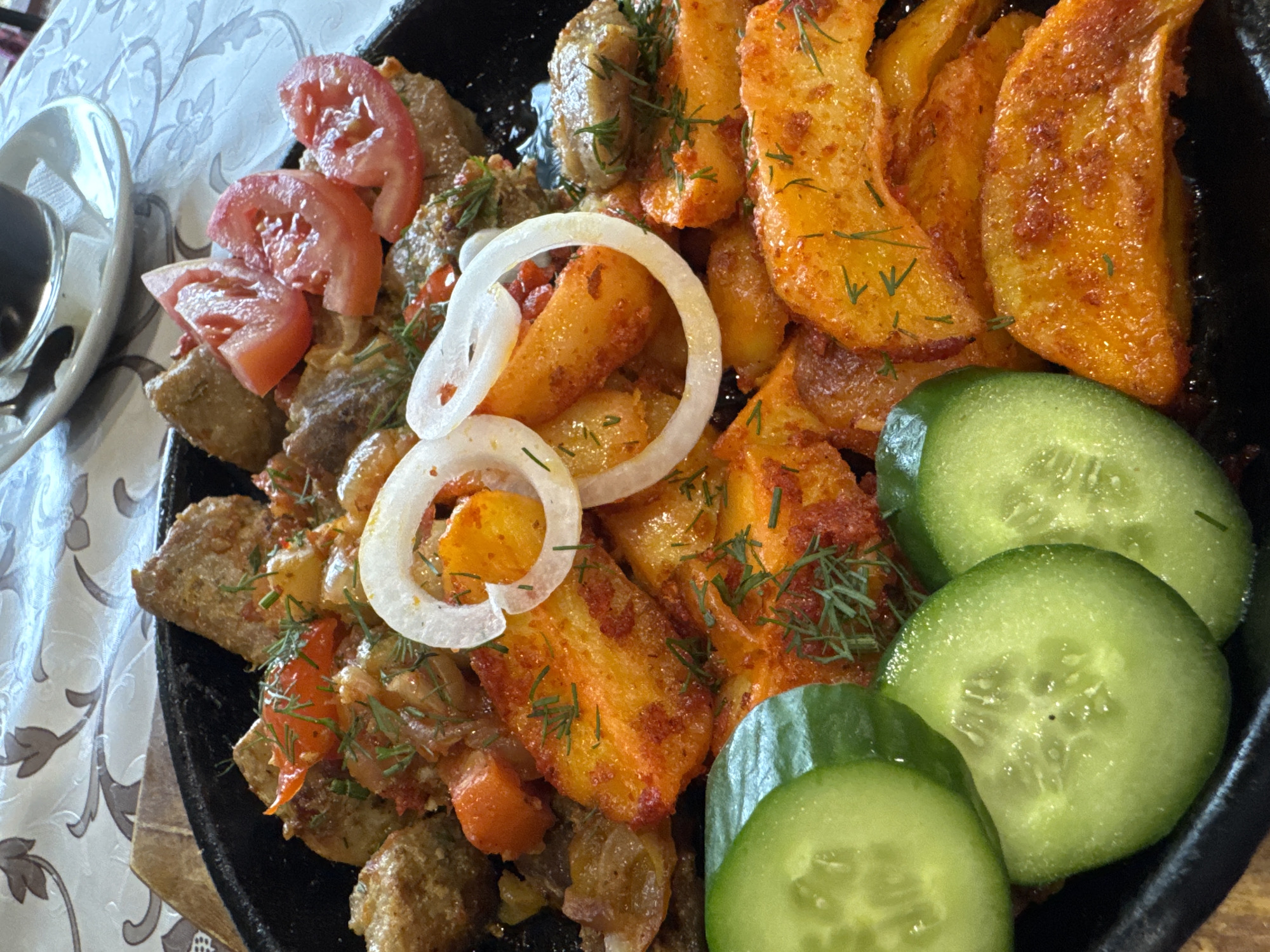 Restaurant visit documented in Bolotnitsa, Russia with traditional meal