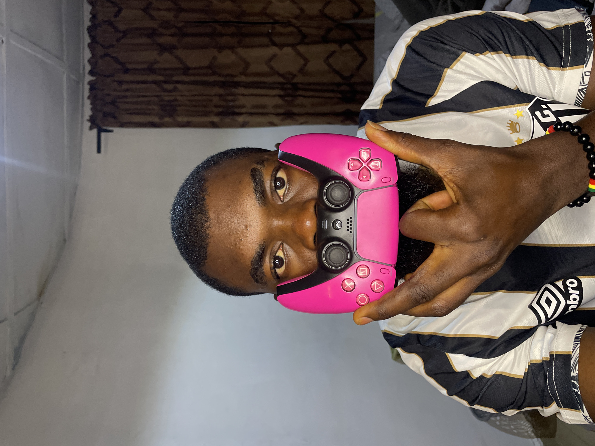 Portrait session in Jos with gaming controllers and layered glasses
