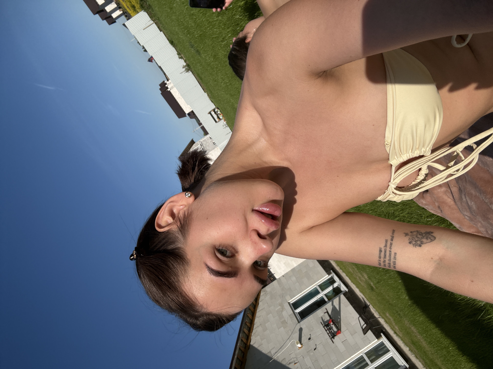 Woman sunbathes with dog in Russian residential area