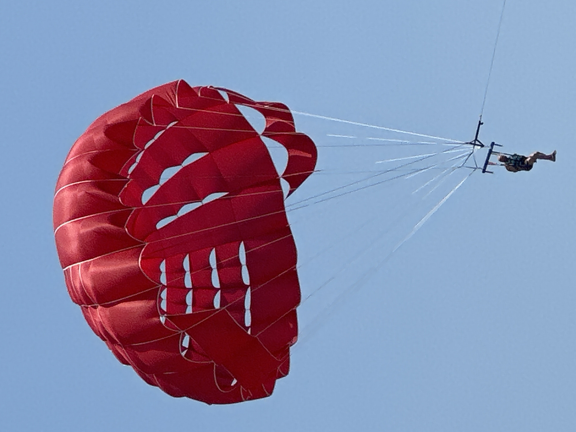 Parasailing and watersports on a sunny Budva morning