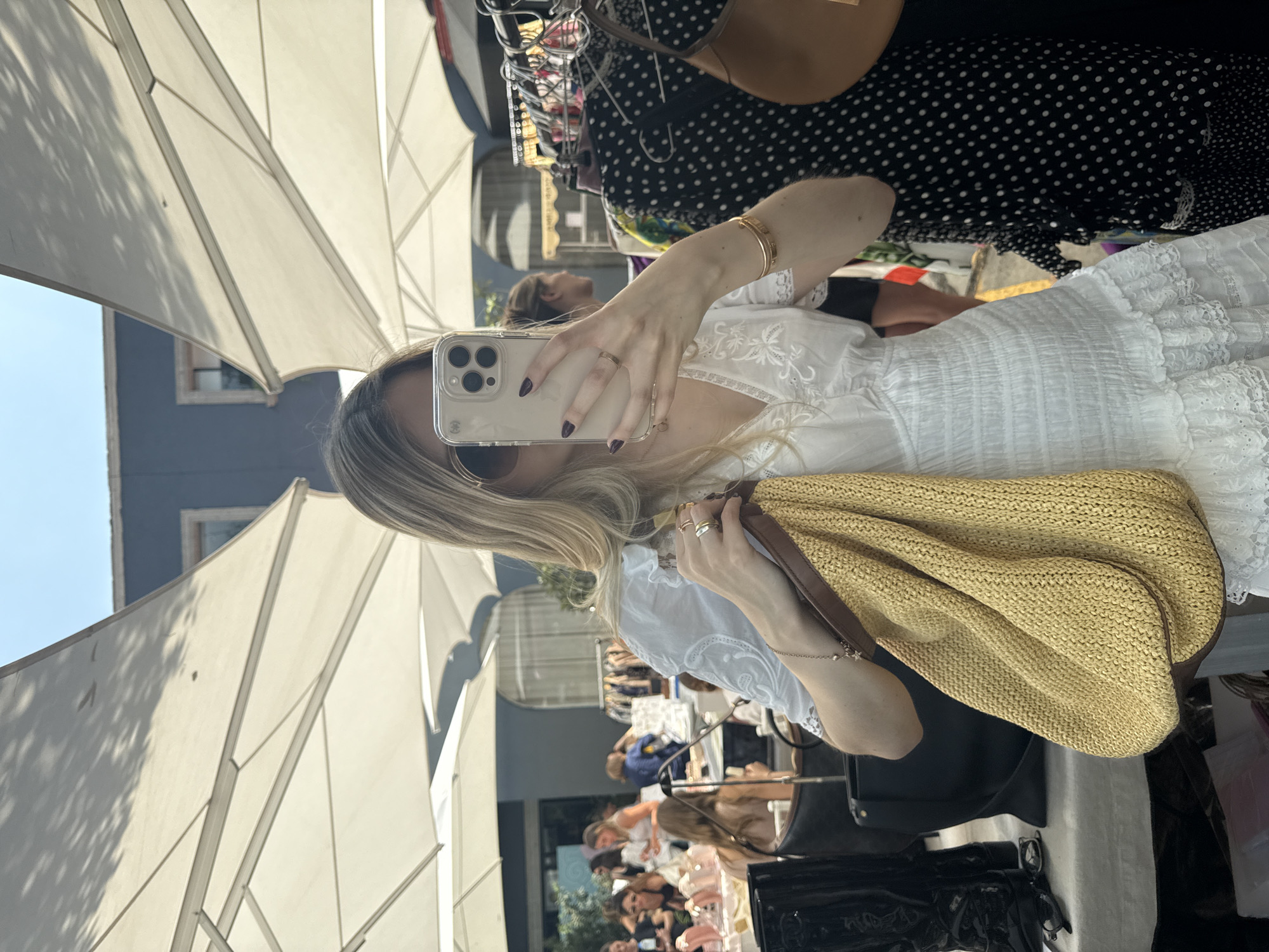 Woman takes selfie at Mexico City street market