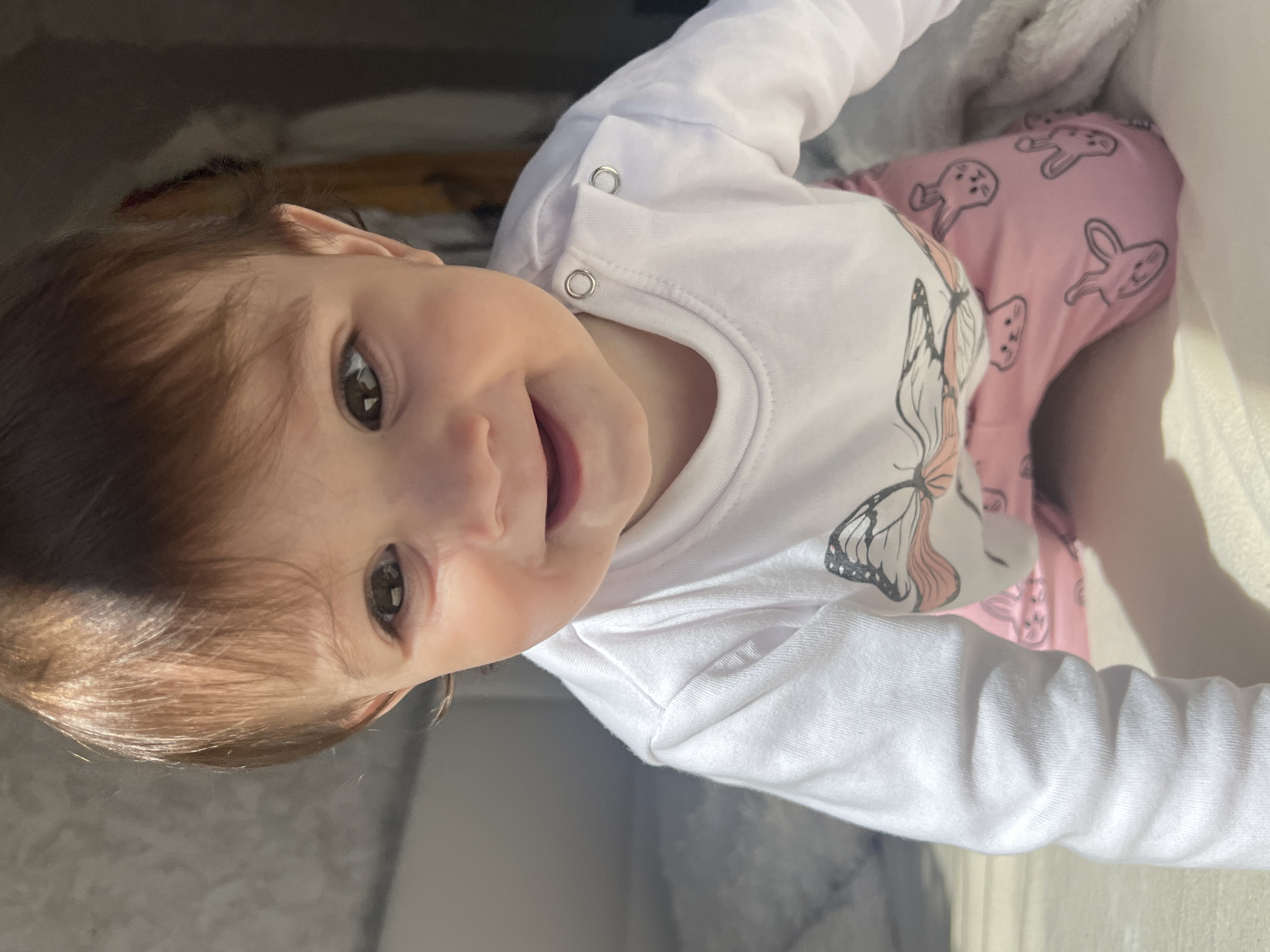 Baby girl photographed in playful moments in Elena, Bulgaria
