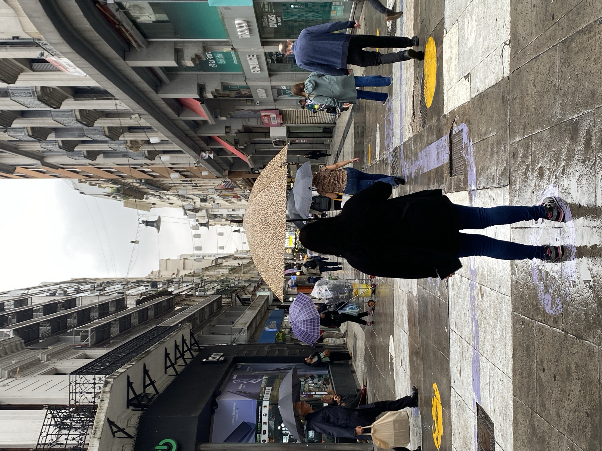 Rainy evening brings umbrellas to Buenos Aires streets