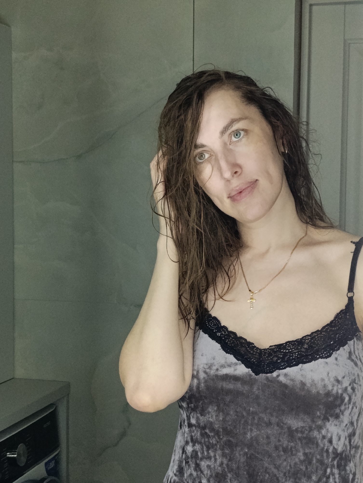 Woman documents morning routine through selfies in Chaikovsky, Russia